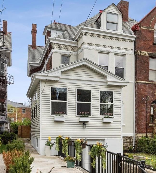 Victorian Era Living, With All The Modern Updates.  This 3 Story Brick Masonry Home Features 6 Bedrooms and 4 Full Bathrooms.  The Perfect Balance Between Original Details and Modern Updates.  Home Is An Attached Single Family.       Listing Agent is Owner