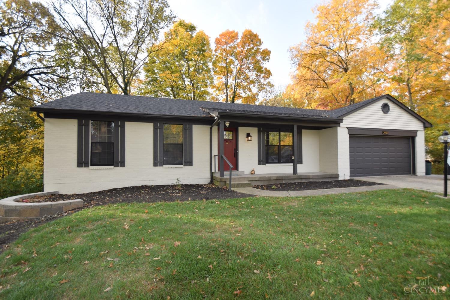 Low maintenance ranch in established neighborhood so you can enjoy life!     2 car garage. 1st level laundry, beautiful open kitchen walks out to large deck. Lower level complete with kitchenette, separate laundry, full bathroom, large space walks out to paver patio. Renovated bathrooms, large plank hardwood throughout. New interior doors and trim. New roof, siding, deck, exterior paint.  Partially furnished. 16 inch plus of blown in cellulose insulation = Extremely low utilities    Evendale residents have access to recreation center with summer pool, children's activities and summer camps, fully equipped gym with classes, community events and concerts.     Don't miss this gem.