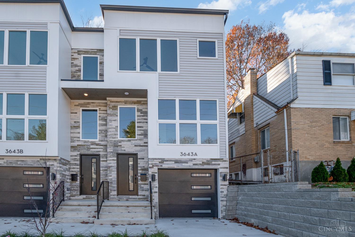 Located in the highly desirable Oakley neighborhood, this newly constructed townhome by award-winning builder Redknot Homes offers modern elegance & exceptional craftmanship. This end unit townhome features 3 bedrooms, 3.5 baths, a private study & a versatile basement flex room.  The gourmet kitchen impresses with Bosch appliances, a gas range & built-in under-counter microwave. The primary suite presents a spacious walk-in closet & luxury bathroom with a tiled shower, double vanities & private toilet room. The basement flex room with an attached full bathroom would make for a great home gym or entertainment room.   Throughout the home you will find thoughtful design touches like ceiling details in the primary bedroom & living room & chair rail in the flex room that takes this unit to the next level. This home is on track to be LEED Gold Certified with a 15-year tax abatement!