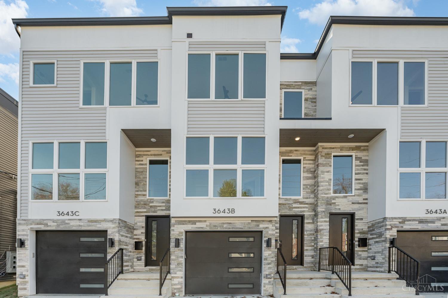 Located in the highly desirable Oakley neighborhood, this newly constructed townhome by award-winning builder Redknot Homes offers modern elegance & exceptional craftmanship. This middle unit townhome features 3 bedrooms, 3.5 baths, a private study & a versatile basement flex room.  The gourmet kitchen impresses with Bosch appliances, a gas range & built-in under-counter microwave. The primary suite presents a spacious walk-in closet & luxury bathroom with a tiled shower, double vanities & private toilet room. The basement flex room with an attached full bathroom would make for a great home gym or entertainment room.   Throughout the home you will find thoughtful design touches like ceiling details in the primary bedroom & living room & chair rail in the flex room that takes this unit to the next level.  This home is on track to be LEED Gold Certified with a 15-year tax abatement!