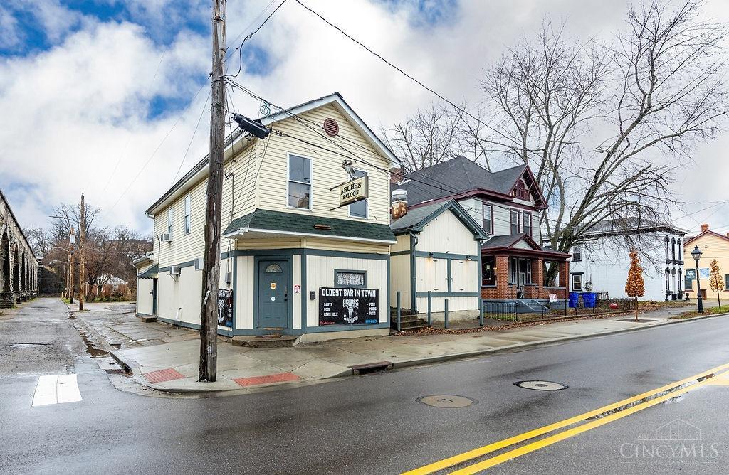 Established business that includes the real estate and liquor license!  Unfinished one bedroom apartment upstairs for additional income. Brand new furnace installed 12/10/2024. Full commercial kitchen and fantastic outdoor biergarten.  Billiard room along with darts makes this a great evening destination.