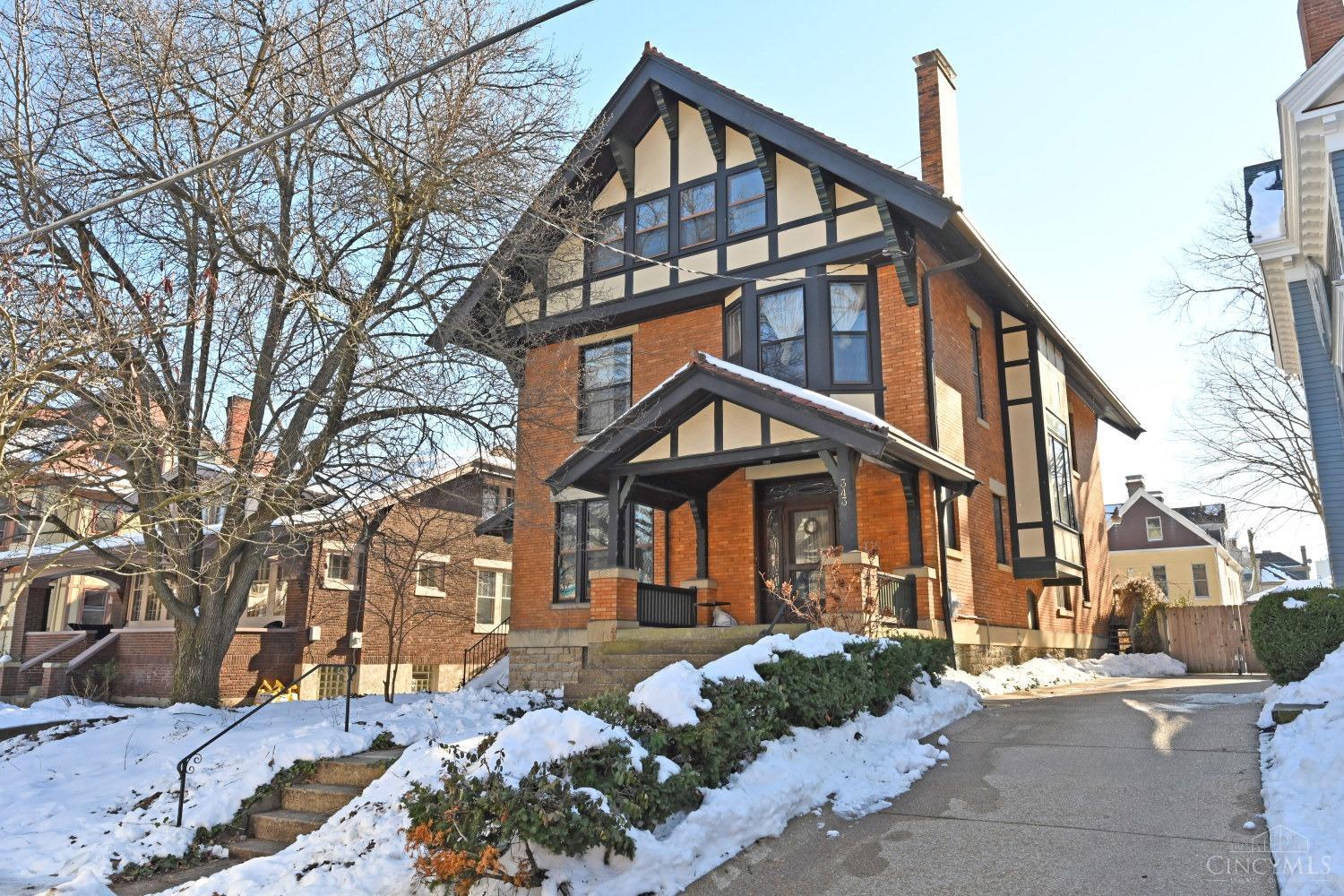 PENDING Before Sent. Rare opportunity to acquire 3,000+SF of living space (w/ 1st fl BR+BA) and make your own in the heart of Gaslight Clifton just blocks from the business district & CANS.  Inviting front porch overlooks the garden & beautiful homes beyond on this sidewalk-lined street off Middleton w/mature trees.  Beautiful stained glass welcomes you to the open foyer where an ornately carved stairwell descends to beautiful benches flanking a mantle. Floor-to-ceiling windows fill the large living rm w/natural light & an equally spacious dining rm at the center of the home leads to a large eat-in kitchen beside it, opening onto a sprawling back patio. Upstairs you'll find a hall bath, family rm & 3 comfortable bedrooms.  One connects to the back stairwell, which leads to all floors.  A cozy study and comfortable 4th bedroom are located on the 3rd floor along w/a flexible great rm w/extra closet space, room for hobbies, additional work space or 2nd family rm - appoint as you see fit