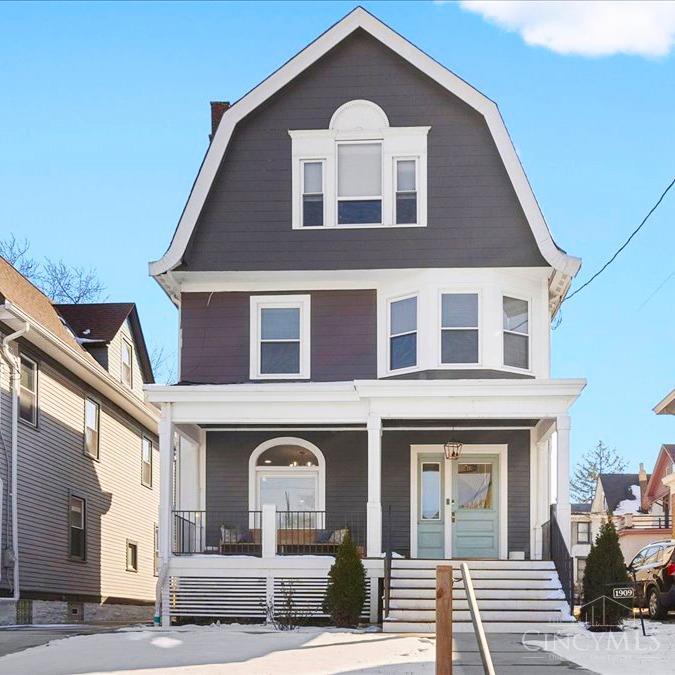Beautifully restored and updated Dutch Colonial Revival home in the heart of Evanston. This home perfectly blends historic charm with modern luxury living, featuring 5 beds and 3.5 baths with over 3,000 sqft of living space.   The open-concept layout features a gourmet kitchen with a large island, quartz countertops, a custom range hood, and high-end stainless steel appliances. A spacious living room with built-in cabinets and selves and an open dining room, perfect for entertaining.   The large primary suite features a fireplace, soaking tub, double vanity, and a custom walk-in closet.   Dual HVAC and water heaters, roof, windows, electric, and plumbing were all replaced in 2022. The backyard includes a deck that was installed in 2022 and a new privacy fence installed in 2024.   This property also has a tax abatement until 2032. Ideally located near Hyde Park, Downtown, and Interstate 71, this exceptional property is not to be missed!