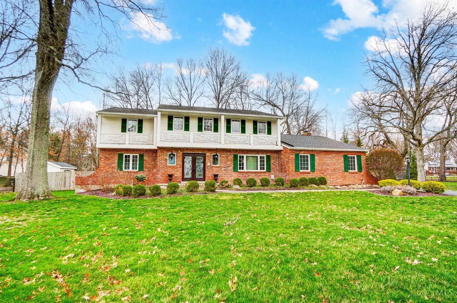 Classic details combine with contemporary updates in this elegant home! Enter through double doors into the grand foyer with split staircase which leads to beautifully renovated eat-in kitchen with quartz counters; 2 sets of French doors off of the foyer lead to the formal dining room and the spacious living room; family room with fireplace & skylight walks out to in-ground pool area overlooking parklike wooded yard; primary suite has been completely remodeled to include dressing room, full bath with double vanities, heated floors & separate walk-in closets; finished lower level offers wet bar, rec room & game room. Kitchen 2023, Roof 2022, HVAC 2023, Water Heater 6-7 yrs