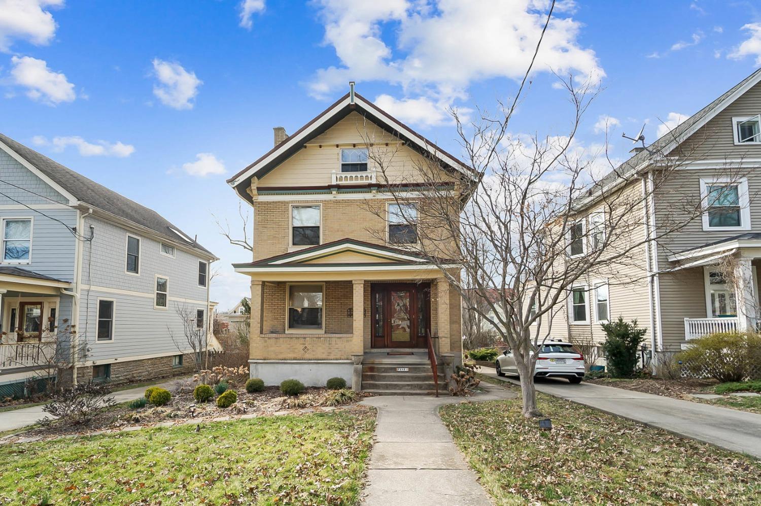 MULTIPLE OFFERS, submit highest & best by Sunday 7PM. Seller reserves right to accept an offer at any time. Stunning property in exceptional location, first time on the market in over 35 years! Located on highly desirable Duncan Ave between Erie & Observatory, just 3 blocks to Hyde Park Square dining & shopping. Architectural integrity has been maintained throughout, w/gorgeous stained woodwork, tile fireplaces, leaded glass entry door, wainscoting, pocket doors, stained glass & original chandelier. Add in well-executed upgrades: high end kitchen w/five burner gas range, custom cabinetry & cork flooring... every touch in this home is superb! Relax & entertain on spacious covered back porch overlooking a private oasis of perennials & lawn. Inside, the 2nd & 3rd floors provide ample bedroom space & two full bathrooms. Excellent potential for third floor primary suite. Additional amenities include covered carport, fenced yard, front & rear sprinkler system.
