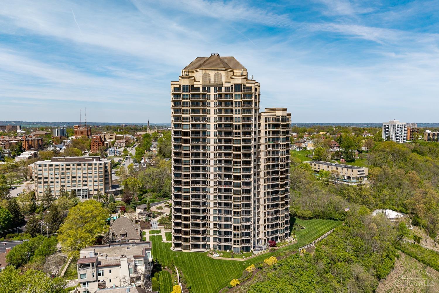 Fabulous Edgecliff Place with beautiful views of the river and hills of Kentucky. Light, bright open living/dining area. Three balconies provide outdoor access from every room. Large primary suite with 2 walk in closets and new carpet. Primary bath has great storage and whirlpool tub. Study with wet bar and built-ins. Large kitchen and laundry room with plenty of storage.  Front desk concierge, exercise room, outdoor pool, guest suites and party room in the Maxwelton House. Unit has 2 garage spaces and a storage room.