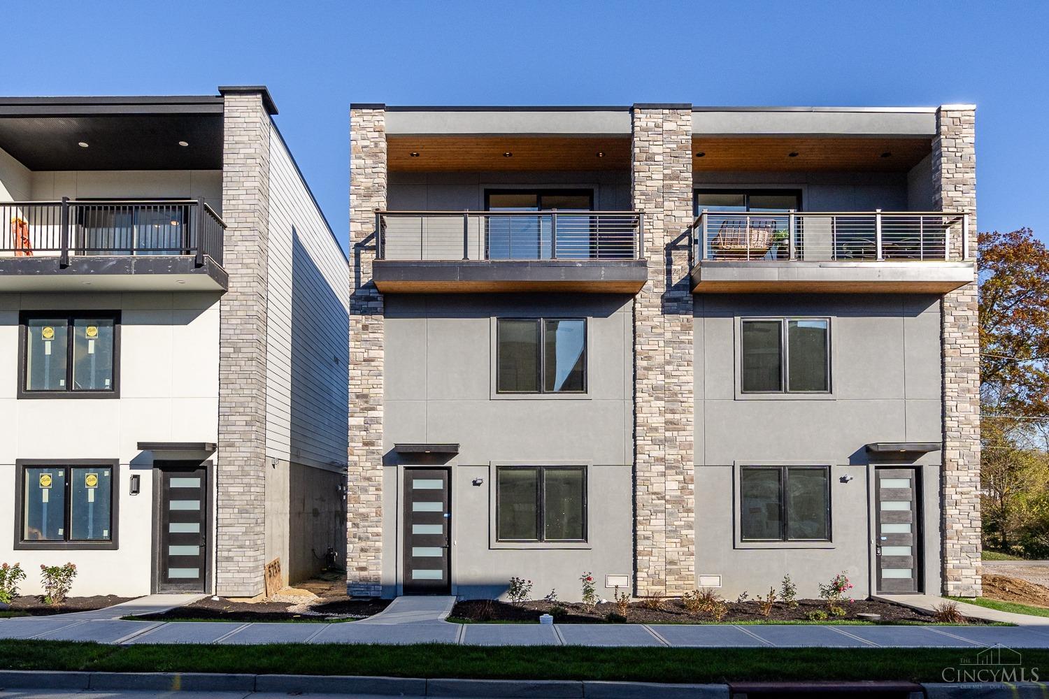 Sophisticated living at The Sanctuary at River Green with panoramic river and rolling hill views! This new Gold LEED Certified home provides fantastic energy savings and is tax abated for 15 years.  Modern high-end design finishes with hardwood floors throughout and a fabulous open floor plan that walks out to the front balcony- perfect for outdoor entertaining with a view! Enjoy quartz counters, stainless appliances and custom wood cabinetry. Enjoy easy living and entertaining with boat ramp access, community fire pit and gathering area on the river's edge, dog park, and community garden all while being minutes to Riverbend, Belterra, and easy highway access. Attached garage with space for up to 3 cars and plenty of room for storage.