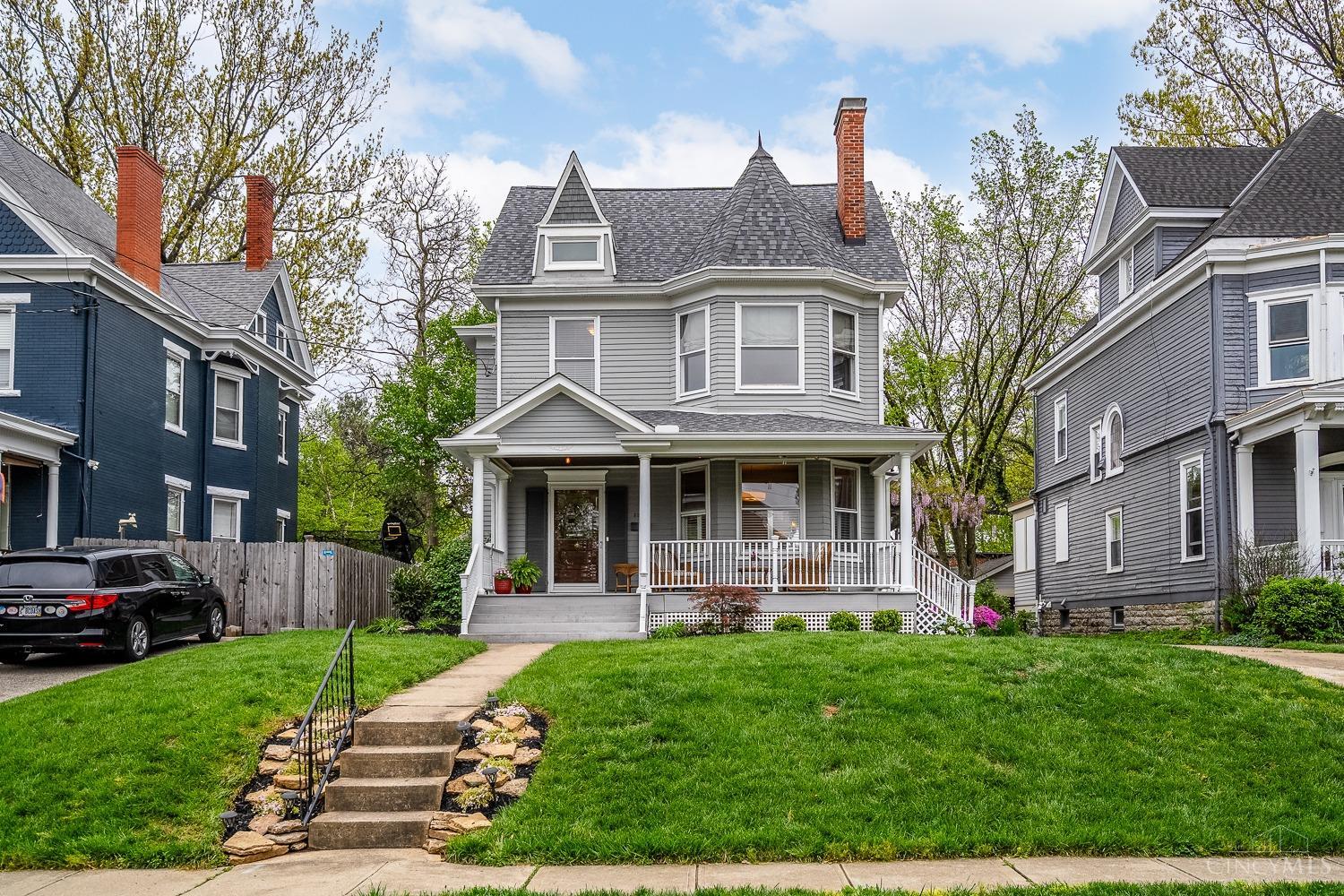 Step into timeless charm with this beautifully preserved 1900s Victorian in the heart of Hyde Park just two blocks from Hyde Park Square! Original hardwood floors flow throughout, complementing the open, inviting kitchen and cozy family room. Sunlight pours in through oversized windows, creating a warm, airy feel in every room. Relax on the stunning front porch or entertain on the back deck under a blooming wisteria-draped pergola. A rare find with a two-car garage this home is full of character, beauty, and unbeatable location.