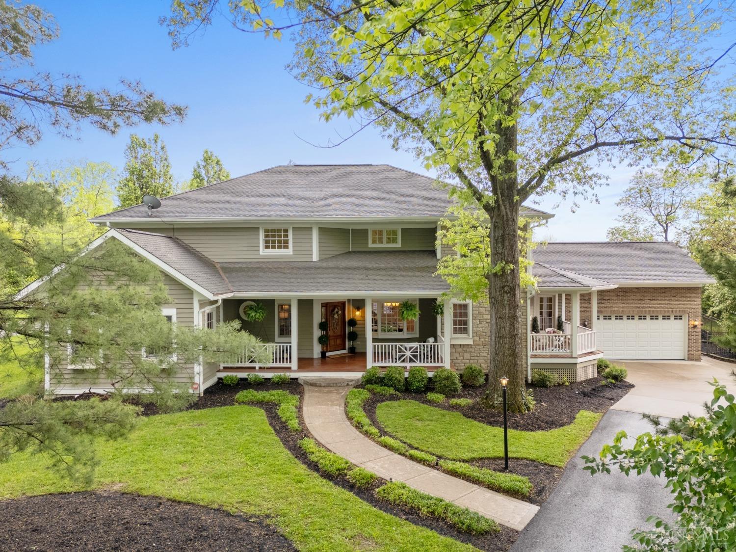 World class private sanctuary sitting 250 ft off-street in the heart of Montgomery! Gorgeous transitional with expansive spaces, an open floor plan of approx 6000+ sq ft, 3 levels of luxury, and incredible outdoor living areas to enjoy including an inground pool & greenhouse with multiple patios and porches! 1st floor primary & study! Oversized bedrooms! 2nd floor loft! Chef's kitchen with maple cabinets, granite counter tops, SS appliances, and huge pantry!  2-story foyer, lots of hardwood, & 2 garages - one was the former horse barn when the property was a farm! New paint, carpet, landscaping 2025. Enjoy Swaim Park just across the street and nearby amenities in both downtown Montgomery AND downtown Blue Ash, easy access to both I-71 and Ronald Reagan Hwy.