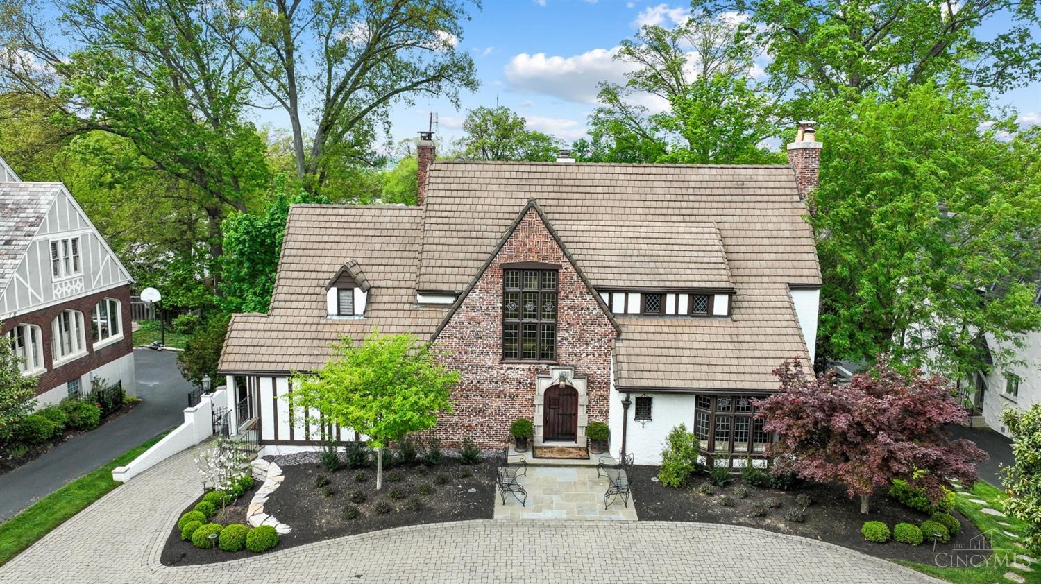 Exquisite English Tudor on prized & picturesque Victoria Avenue*One of Hyde Park's finest homes with superb architectural details at every turn*Over 5,000 square feet of high-end living space with beautifully appointed & generously proportioned rooms*Impeccably maintained, updated & improved with original details well preserved*Elaborate craftsmanship*Intricately carved natural woodwork*Pegged hardwood floors*Stained + leaded glass*Rookwood tile*Chef's kitchen with fireplace open to inviting family room*Great room with striking beam ceiling*Stunning formal dining room*Paneled study with wet bar*Marvelous primary suite with mirrored dressing area*Spacious secondary ensuite bedrooms*Expansive finished walkout LL with well-equipped tavern style wet bar/rec room/exercise studio/full bath*Sprawling covered patio with fireplace overlooks private & flat lawns with lush landscaping*Built-in 2-car GAR*Ideal location 1 mile from both Hyde Park & Mt. Lookout Squares.