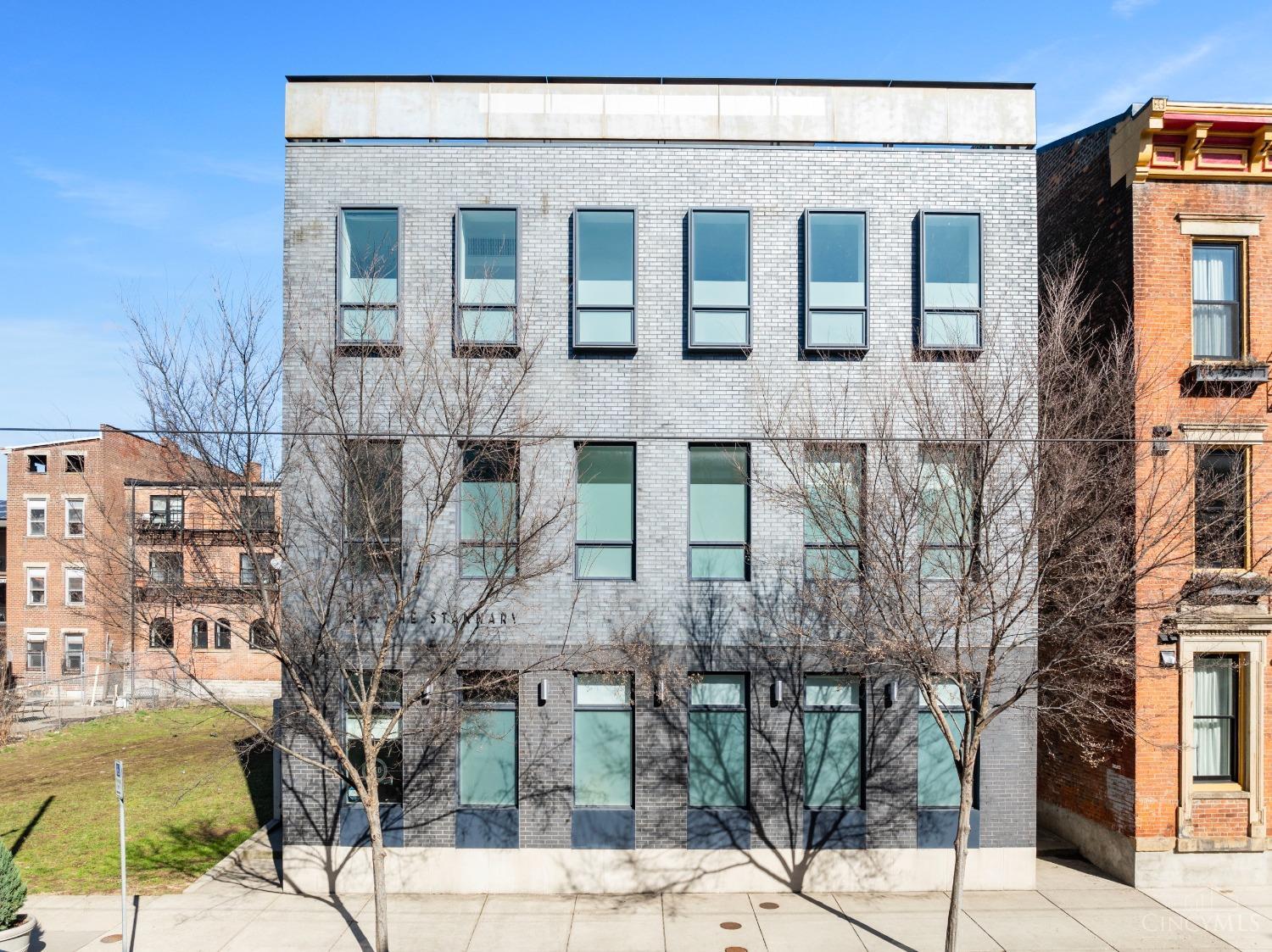 Amazing OTR location. Open, light filled 1,400 SF urban retreat located in award-winning building. On the streetcar line, just a block from Washington Park, and moment to restaurants, entertainment, cultural venues, shopping, and Findlay Market. Two primary suites each with luxury bath. Abundant storage space. One car garage. LEED Gold and AIA award-winning 3-unit building. Tax abated through 2032.