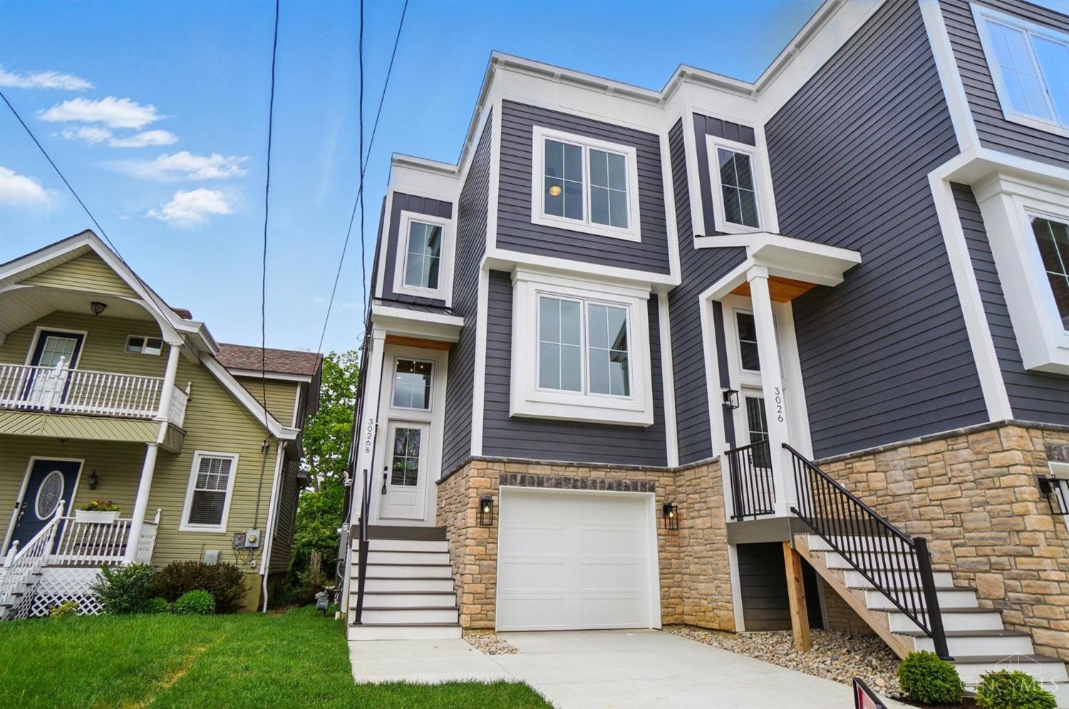 Move-in ready LEED Gold and tax abatement eligible New construction single family home! Designer finishes, 2nd floor laundry, over-sized single car garage, finished lower level + a private terrace, rear deck and an amazing rooftop deck with an entertainment bar. Walk to OBryonville and E Walnut Hills business districts. Likely the last LEED Gold house to be sold in city with full 15 year abatemnent on the original program!