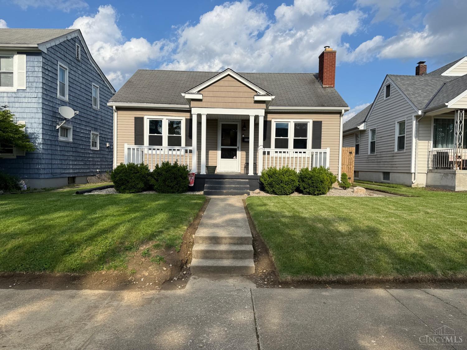 Don't miss out on this adorable Cape Cod situated on Hamilton's West Side. This home needs nothing but a new owner. Conveniently located between Spooky Nook and Highland Park on a quiet street, the upstairs can easily be converted into 1 or 2 additional bedrooms. Alley access gives you off street parking. The full privacy fence in the back yard will make entertaining a pleasure. The arched entry into the breakfast nook will provide an ideal place for coffee, reading, or more.