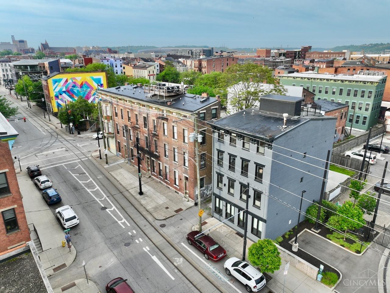 Rare 3bed/2.5bath condo next to Findlay Market! Beautifully renovated in 2022, this 1334sf 2 story unit includes keyless entry & 1 secure, assigned parking space. Stylish kitchen features quartz countertops, island, gas range & subway tile backsplash. 2nd floor Primary Suite w/walk-in closet, dbl vanity & frameless glass shower. Steps to Findlay Market, Rhinegeist & Streetcar stop. Excellent proximity to the Central Business District, UC & hospitals. LEED Gold certification keeps the utility bills low. HOA allows short term rentals & some of the existing furniture is negotiable.