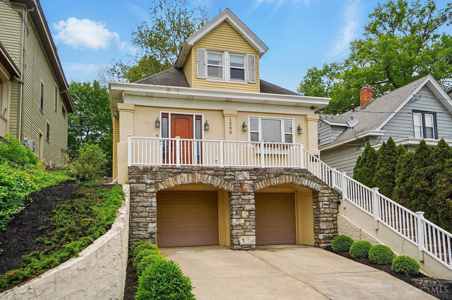 Hyde Park living at its finest! Just steps away from Hyde Park Square - this gorgeous 4 Bed 2.5 bath two story boasts an open floor plan with a remodeled gourmet kitchen, first floor study w/ custom cabinetry, rare 2 car built-in garage, spacious first floor mud/laundry room,  large stone patio and covered trex deck overlooking spacious back yard & fresh new landscaping, 2025 Brand New back yard retaining wall, 2024 New sewer liner installed, New carpet throughout second floor, New front door, finished LL workout/ rec room, and so much more! Please leave offers open 48 hours.