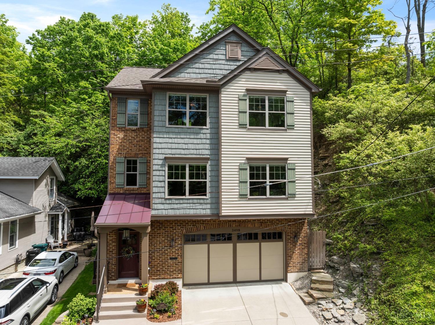 High efficiency/low maintenance custom designed urban retreat built in 2016. Open, versatile floor plan invites effortless entertaining & comfortable family living. Beautiful designer kitchen has island seating for 8, opens to family rm with dry bar, dining rm, great rm, and large deck. Lower level 4th BR doubles as media room/studio apartment with separate private entrance, large wet bar, full refrig, surround sound, and rear projector with electric hidden screen. Spacious primary suite with luxury bath and spacious shower. 1st floor study. Large 2-car-garage w/driveway parking for 4 more vehicles. Professionally landscaped. Tax abatement. Prime Location near Hyde Park, Oakley & Mt. Lookout Square(s), Ault Park, HP Commons playground/tennis facility, Wasson Way and East HP restaurants. All offers will be reviewed 5/19/2025 at 12:00 noon. Please leave open until 11:00 am 5/20/2025, Sellers reserve the right to accept an offer at any time.