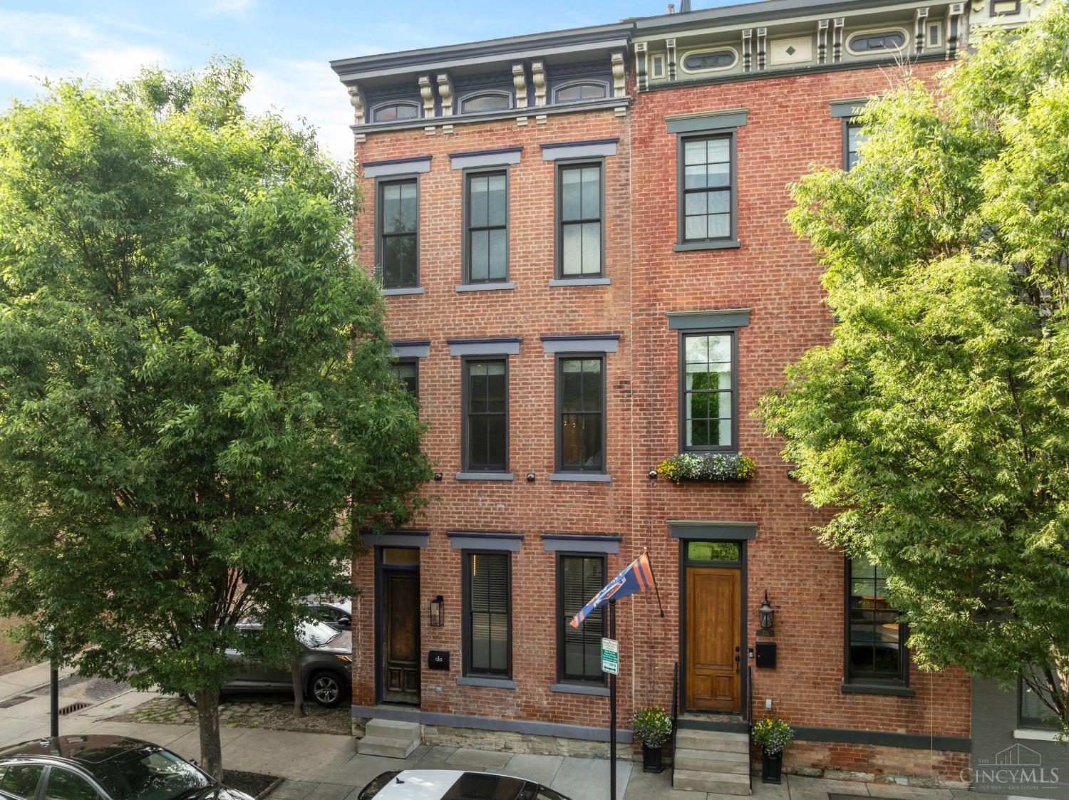 Rare chance to live directly across from Washington Park! With over 3,200 finished sq ft, this fully renovated home blends timeless charm with modern updates. The main level is open, bright, and features a stunning kitchen with abundant cabinetry and storage. Almost the entire second floor belongs to the primary suite with tall ceilings, large windows, spa-like bath, and walk-in closet with direct access to the laundry room. The third level offers a bright guest room, large hall bath, and a sunlit custom bunk room. The crown jewel is the fourth floor entertaining space; double doors open to a rooftop deck w/ city views, a wet bar, second fridge, full bath, and projector setup for championship games and movie nights. A recently added fourth bedroom (currently craft room) is also on this level. Enjoy additional outdoor living in the beautifully designed courtyard. With 3 dedicated parking spots right outside the gate, this home offers the best of city living: location, space, and style.