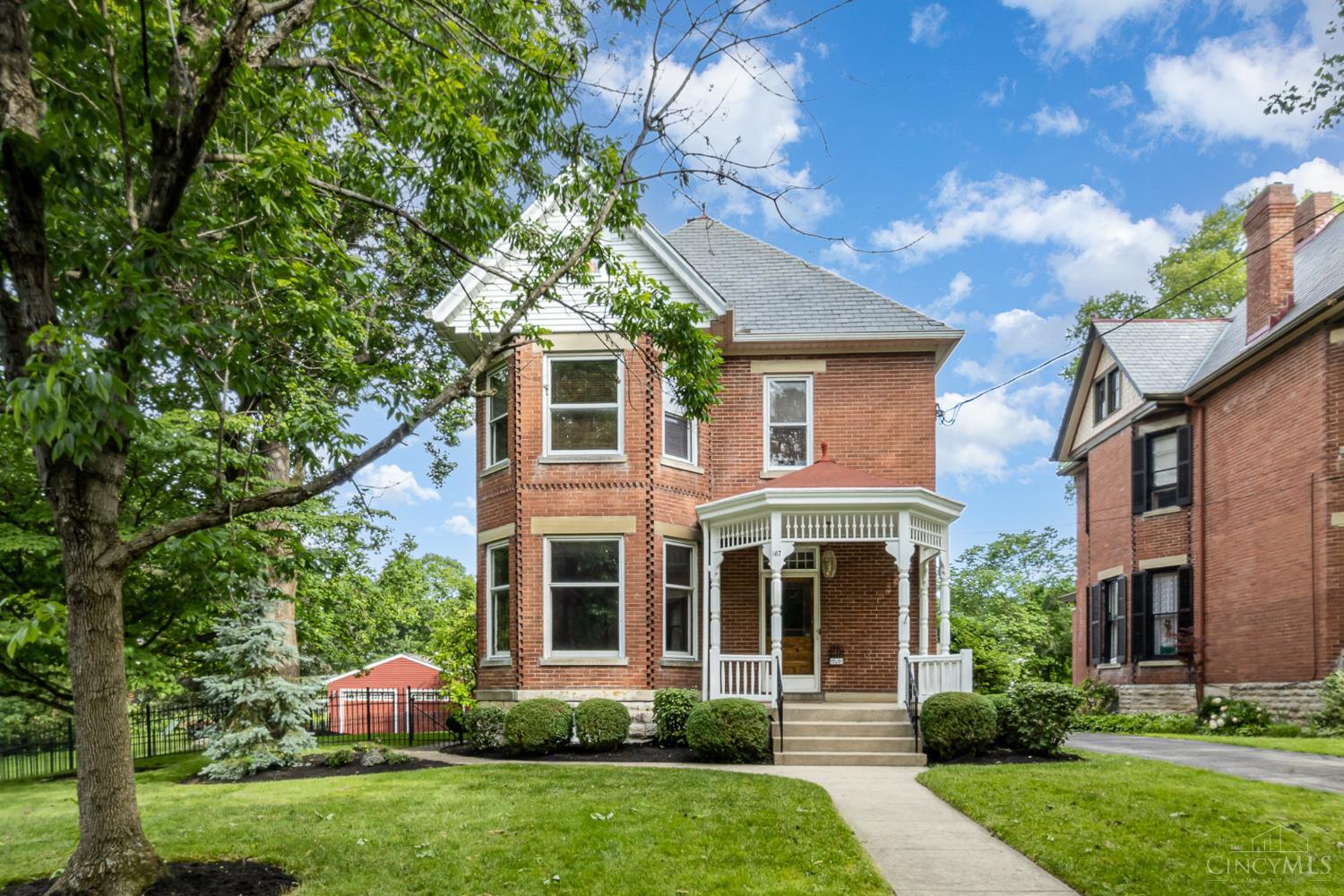 Nestled in the heart of the historic Sayler Park neighborhood, this stunning 1890 Victorian residence offers timeless elegance on a rare triple lot, spanning over half an acre. With only four owners in its 130+ year history, this cherished home has been lovingly maintained and thoughtfully preserved. Boasting 4+ bedrooms and 1-1/2 baths, the home features original architectural details, high ceilings, two staircases, and vintage woodwork that echo its rich past. Whether you're hosting or relaxing, enjoy the in-ground pool set amidst a serene, partially fenced yard perfect for entertaining, gardening, or simply soaking up the charm of your expansive outdoor oasis. A true gem in one of Cincinnati's most treasured neighborhoods, this property combines old-world character with rare outdoor space, making it a unique opportunity for both historic home lovers and those seeking room to grow. Don't miss your chance to own a piece of Sayler Park history!