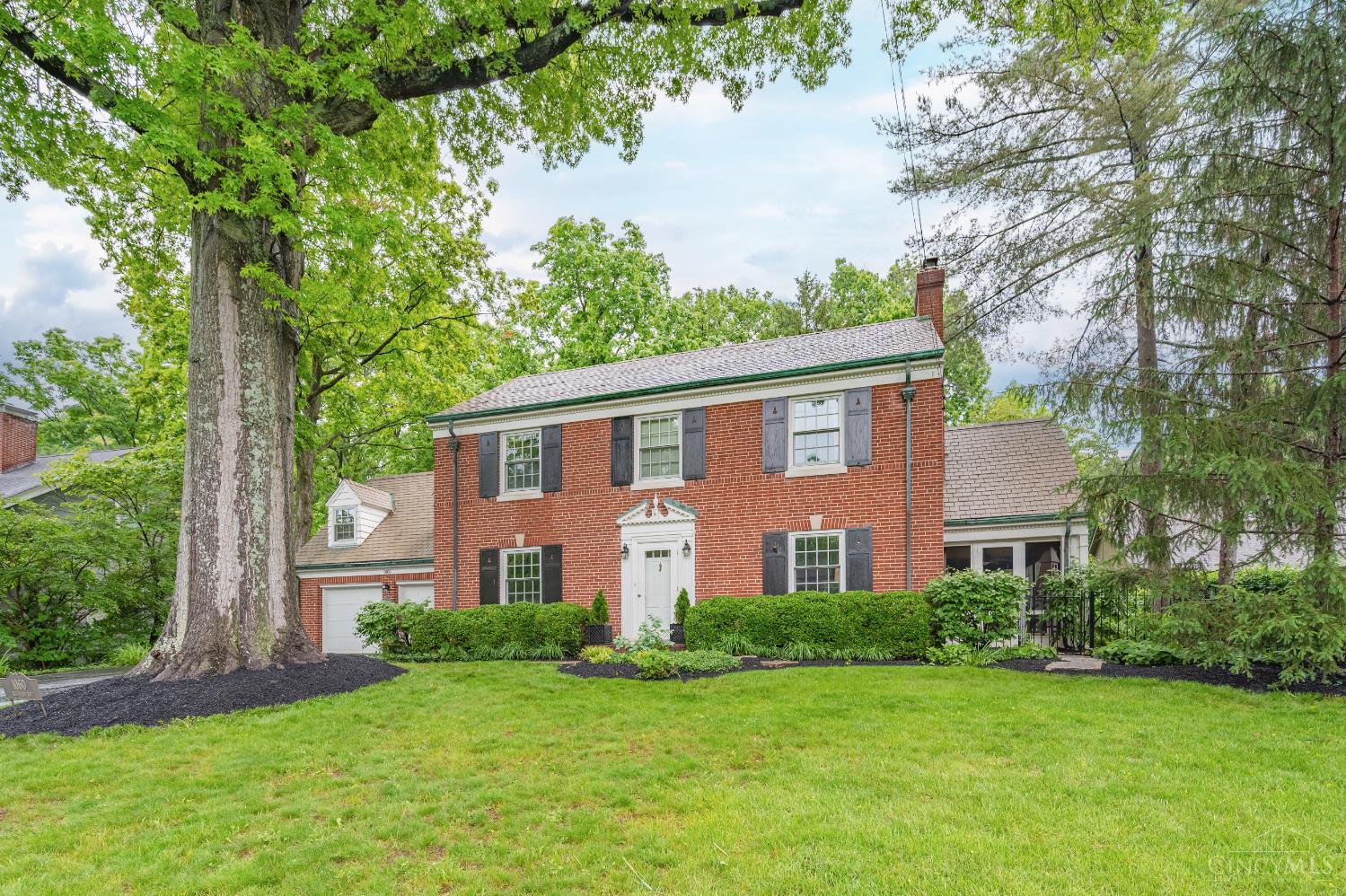 Classic brick colonial on a prized Mt. Lookout Street! Well maintained and nicely updated 4 bedroom 2 and 1/2 bath home on a beautiful wooded lot. A new cooks kitchen, large family room and plenty of storage. Amazing outdoor space with new deck, screened porch and large yard with wooded view. Walk to Kilgour and Ault Park! Photos will be uploaded 05/21. Open house 05/22 from 4to 6 p.m.