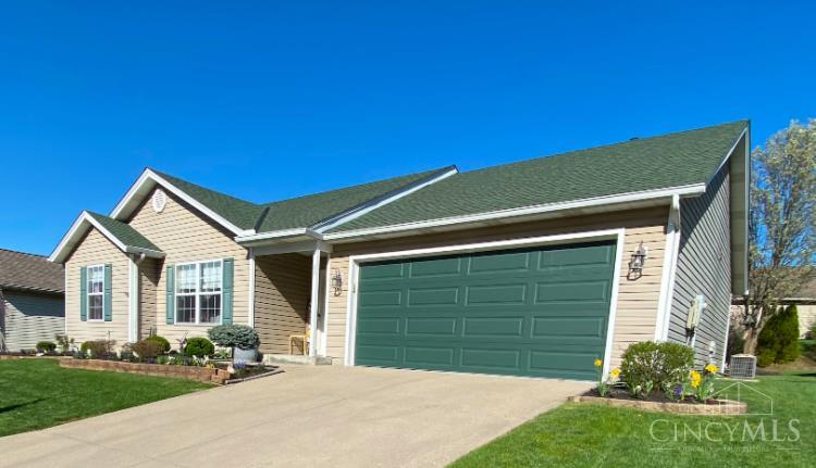 This lovely ranch has a beautifully landscaped outdoor living space. Pride of ownership shows and this home has been lovingly maintained!   Some great features include: an invisible fence for pets (with collar) Home Safe security hardware, and a lovely covered patio with matching furniture and electric grill. Enjoy sitting by the lovely pond, or take your fishing pole and catch a few! Inside is an electric fireplace and ceiling fans in every room.  All new within the last 3 years: Plank flooring throughout, stainless kitchen appliances & washer and dryer. All stay with the home.  Don't miss out on this one!