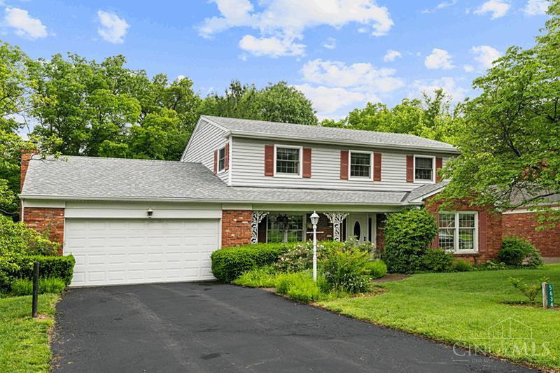 Amazing opportunity in Heitmeyer Farms, one of the most desirable neighborhoods in the area! Nestled between Kenwood and downtown Blue Ash, this meticulously maintained 4-bed, 2.5-bath home is in Indian Hill Schools. Located on one of the best lots in the neighborhood with a beautiful yard and creek. Inside: Pella windows, 200 amp electric, hardwood floors in living, dining, and study. Kitchen opens to family room with wood beams and wood-burning fireplace w/gas starter. Private study with built-ins and garage access. Spacious primary suite with sitting area, walk-in closet, and ensuite bath. Three additional bedrooms share a full bath with double vanity. Walk-out basement with rec room, bonus room, and large storage/workshop area. Front porch, 2-car garage. Ready for the next owner's custom touches and personal finishes. Minutes to shopping, dining & major highways!