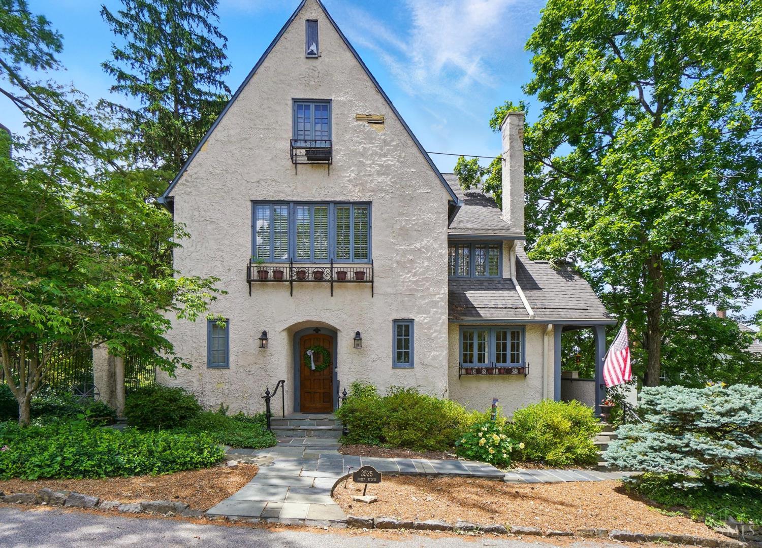 Welcome to 3535 Holly Lane - An incredible opportunity to add your personal touch and make this charming Hyde Park gem your own. This 5-bedroom, 3.5-bath home offers comfort across three expansive floors. The tiled entryway shows an elegant banister and leads into a generous first-floor living space featuring wood-beamed ceilings, a wood-burning fireplace, and French doors opening to a bright sunroom. The formal dining room is perfect for entertaining, while the kitchen includes a butler's pantry and a gas range. Upstairs, the primary suite boasts hardwood floors, two oversized walk-in closets, and an en-suite bath. Two additional bedrooms and a flex room with built-in bookshelves. The third level features a private bedroom, full bath, & an additional flex space. Enjoy wooded views from the back deck & a fully fenced yard. Conveniently located near Hyde Park square, Rookwood Commons and O'Bryonville