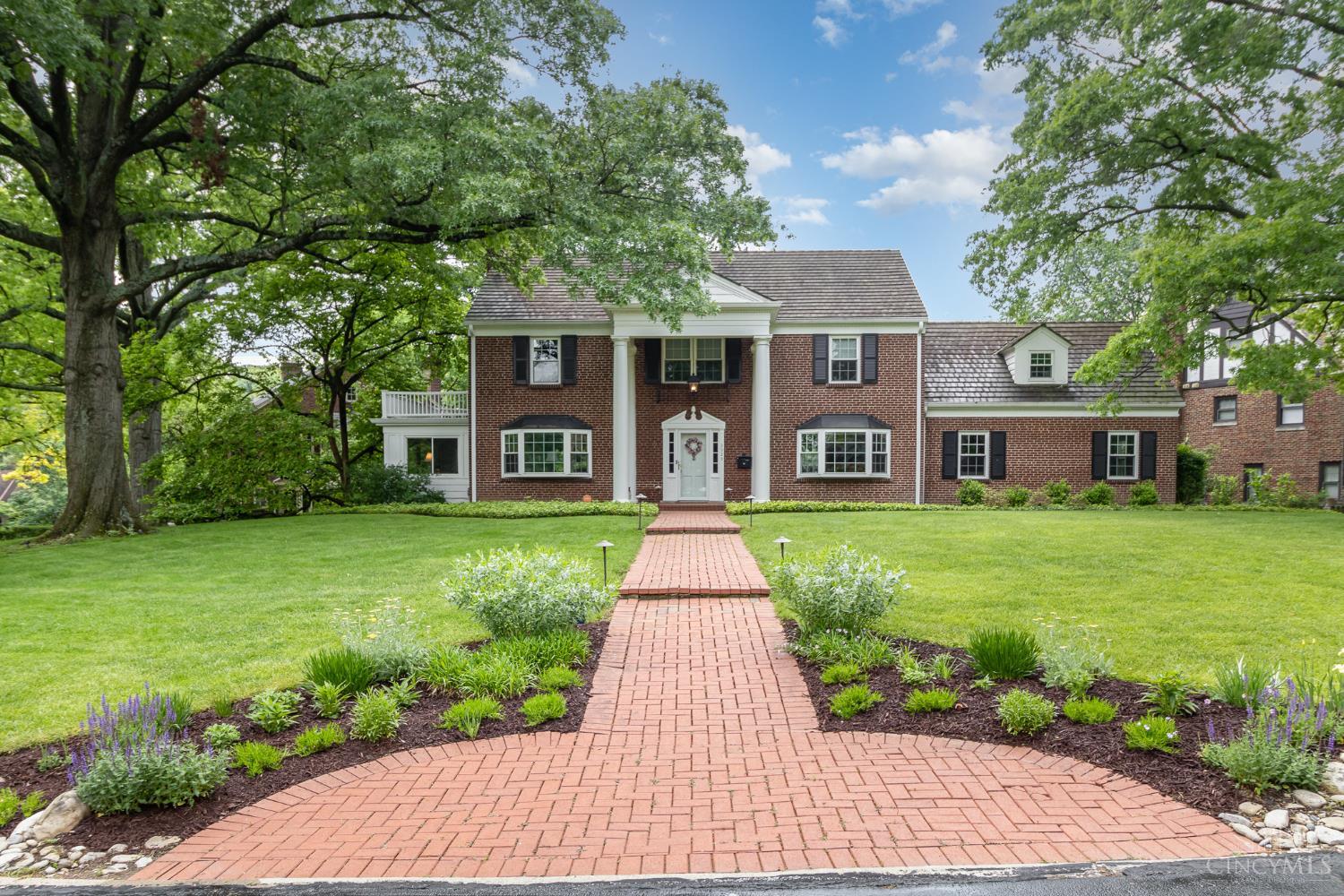 Located in the Gaslight district on one of Cliftons most prestigious sought-after streets with welcoming neighbors and vibrant community spirit-don't miss your chance to join the local Toddy Tuesday club! This charming home is filled with Southern elegance, featuring hardwood floors, a gourmet kitchen, and a finished lower level perfect for entertaining or extra living space. Enjoy beautifully maintained park-like setting with manicured landscaping supported by a full irrigation system. Ideally situated near UC, Walnut Hills High School, and the Cincinnati Zoo this home blends location, historic charm, and modern convenience seamlessly.