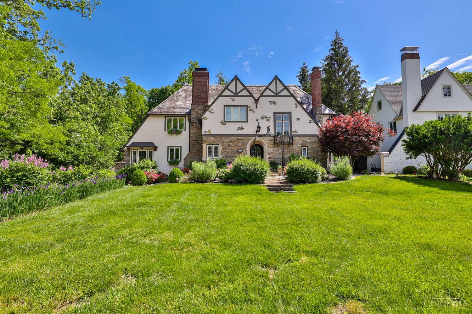Beautiful home, perfect location, unbelievable yard! Welcome to 3075 Victoria Avenue. Located on one of Hyde Park's most coveted streets, this 5BR fabulous home with 5 Full updated Bathrooms has been tastefully updated with the finest architectural details. The gourmet, eat in kitchen opens into a family room with vaulted, beamed ceilings and wet bar, overlooking the incredibly spacious backyard and wonderful outdoor space. The pond outside adds the perfect ambience while relaxing or entertaining on the large patio that has been landscaped to perfection. Oversized carport with additional storage. Walk to everything that Hyde Park Square, East Hyde Park, and Mt. Lookout Square have to offer. Secondary laundry on 2nd floor, slate roof impeccably maintained, Added 4 HVAC units for zoned heating and cooling, newer water heater. Tons of storage in lower level with full bathroom. A true gem! Interior photos loaded 6/4.