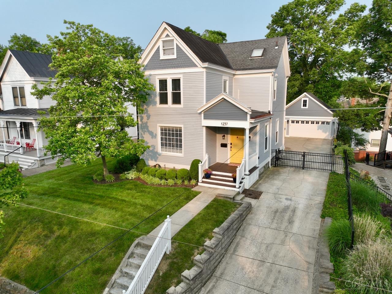 Move-in ready 3-bedroom, 2.5-bath home with over 2,500 square feet situated in a premier Mt. Lookout location. Centrally located near Mt. Lookout Square, Kilgour, Ault Park, & Hyde Park Square. Completely renovated in 2012 & recently updated w/new Hardi Board siding, foam insulation, box gutters, refrigerator, stovetop & washer/dryer. The second-floor primary suite features an en-suite bathroom w/double vanity & walk-in closet. The open gourmet kitchen includes a large island, double ovens, beverage center & refinished wood cabinets. The family room is equipped with a built-in media center & walkout to the patio. A spacious detached two-car garage includes a mini-split system, 60 amp service & ample storage space. The attic bonus room serves as an excellent playroom. Fenced rear yard & remote-controlled gate provide security & easy access. This is a fantastic home in an exceptional location! Please leave offers open for 48 hours; the seller reserves the right to accept offers prior.