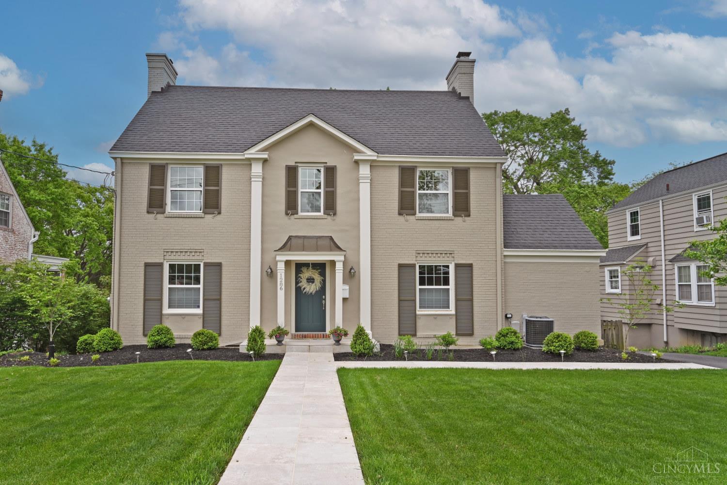 Impeccably maintained center-hall Colonial. This elegant home offers timeless curb appeal & 4 fully fin levels of comfortable, functional living space. 3rd flr features 2 spacious bdrms & a full bth rm ideal for guests, family, or a home office. 2nd level has a luxurious primary suite, 2 addt'l bdrms, full hall bth, & a conveniently located laundry rm. The inviting 1st flr boasts an open layout w/ a welcoming foyer, bath, large dining rm off the kitchen & a cozy living rm centered around an inviting fireplace. Versatile sun room perfect as an office/playroom opens to a generous deck overlooking a flat, fenced bckyrd, ideal for entertaining/play. The fin LL adds more flexible living space w/ a rec room, 2nd half bth, addtn'l laundry rm, & storage. The well-appointed kitchen features abundant cabinetry, a backyard view, & an eat-in peninsula for casual dining. 2-car garage in the rear of home. Just blocks from Ault Park, Mt. Lookout Sq, & top-rated schools. Partial tax abatement remains.