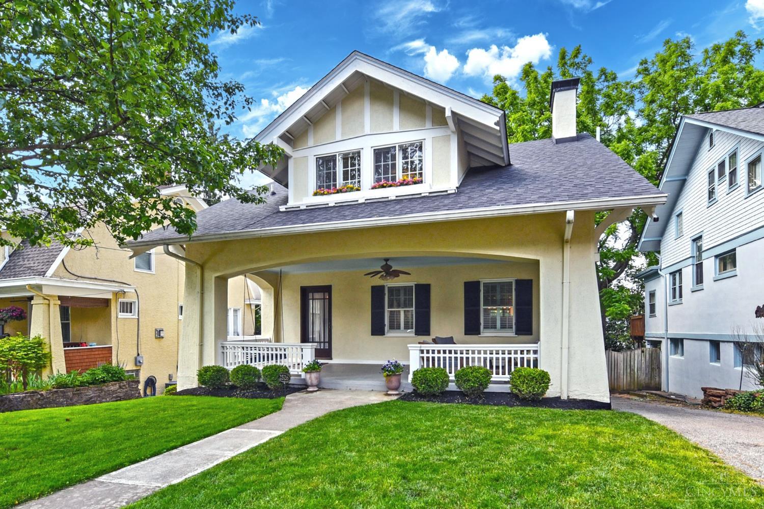 Stunning home nestled on one of Hyde Park's most picturesque streets. Offering over 2,600 square feet of finished living space, this 4-bedroom, 3.5-bathroom residence blends timeless character with modern comfort. The inviting front porch is perfect for enjoying the neighborhood's charm, while inside, original architectural details shinewood-beamed ceilings, built-in shelving, and a cozy fireplace anchor the sun-drenched living room. The generous primary suite features a walk-in closet and ensuite bath. Downstairs, the finished lower level adds valuable space with a large family room, full bath, and fourth bedroomperfect for guests, a home office, or flex space. Out back, a freshly painted deck overlooks the fenced yard, ideal for entertaining or relaxing beneath the trees. A rare opportunity to enjoy space, style, and an unbeatable location just minutes from Hyde Park Square and Cincinnati Country Club.