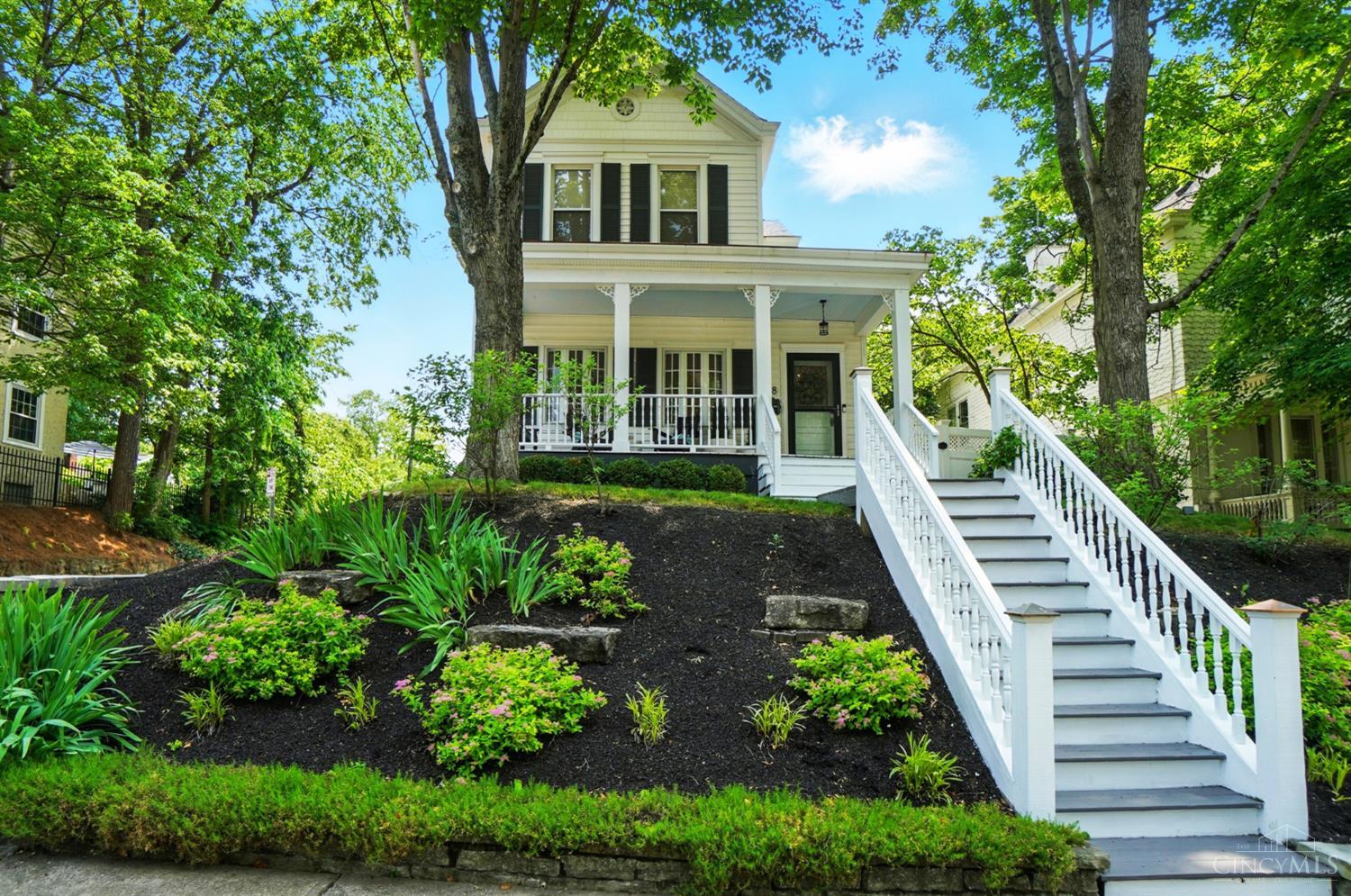 Welcome to 1178 Herschel Ave. This beautifully maintained two-bedroom, one-and-a-half-bath Victorian is full of character & curb appeal. Enjoy the inviting covered front porch & step inside to a tiled entryway that opens to a light-filled living room w/ French doors & a fireplace. The spacious dining room features hardwood floors & leads into an open kitchen w/ wood cabinetry, ample counter space, & windows that fill the space w/ natural light. A convenient half bath completes the main level. Upstairs, hardwood floors run throughout, w/ brand-new carpet in the bedrooms. Primary suite offers walk-in closets, en suite bath with a soaking tub, standing shower, double vanity, and skylights.    Step out from the kitchen into a beautifully landscaped backyard featuring a private patio, side yard, & a finished she shed'' perfect for an office or studio. A detached garage, updated stone retaining wall, and quiet corner lot setting add to the home's appeal. Just minutes from Mt. Lookout Squar