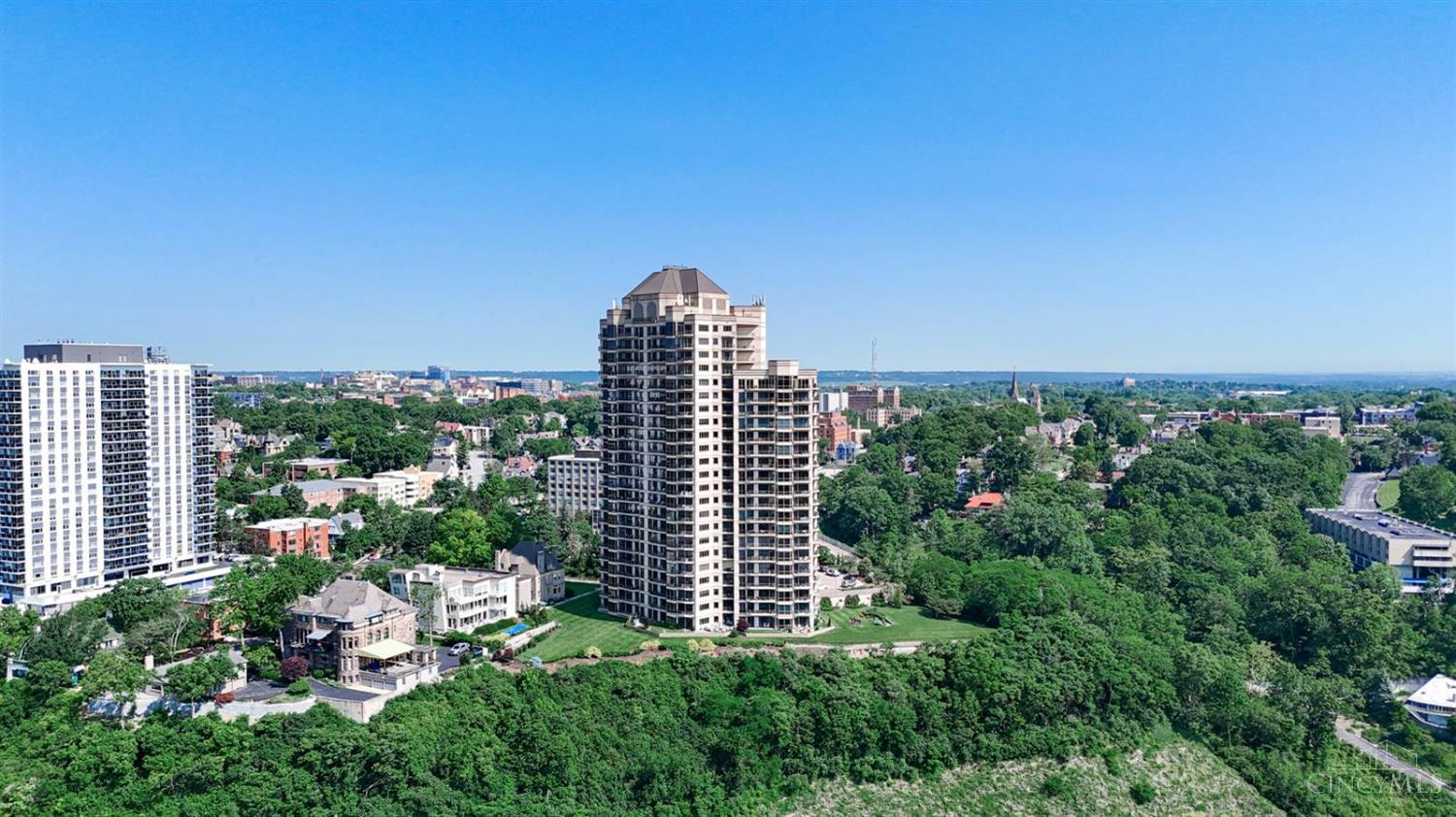 Sophisticated condo in desirable Edgecliff Place featuring a wall of windows and 3 private balconies offering breathtaking panoramic views of the Ohio River. This 2 bed, 2 bath home boasts an open floor plan perfect for entertaining, with abundant natural light and seamless indoor-outdoor living. Enjoy luxury amenities including a front desk concierge, fitness center, pool, guest suites, and more- all in a premier location just minutes from downtown. Urban living at its finest!