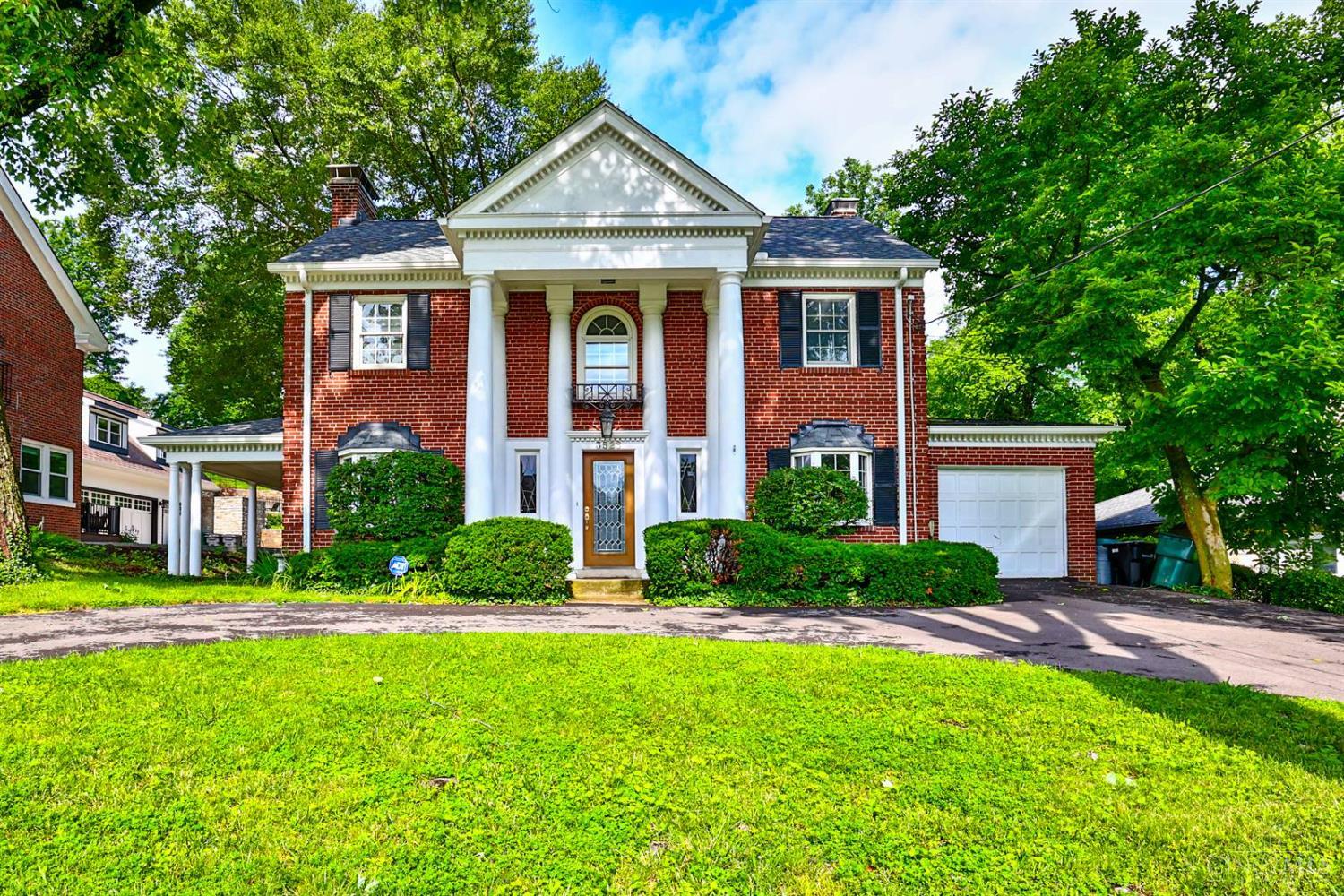 Stately Brick Colonial. Walk to Ault Park, Kilgour School, Mt. Lookout Square, Hyde Park Square. Rear yard opens to the Cincinnati Observatory. Spacious, light-filled rooms. Hardwoods. Owner/agent. Prime location, immediate occupancy.