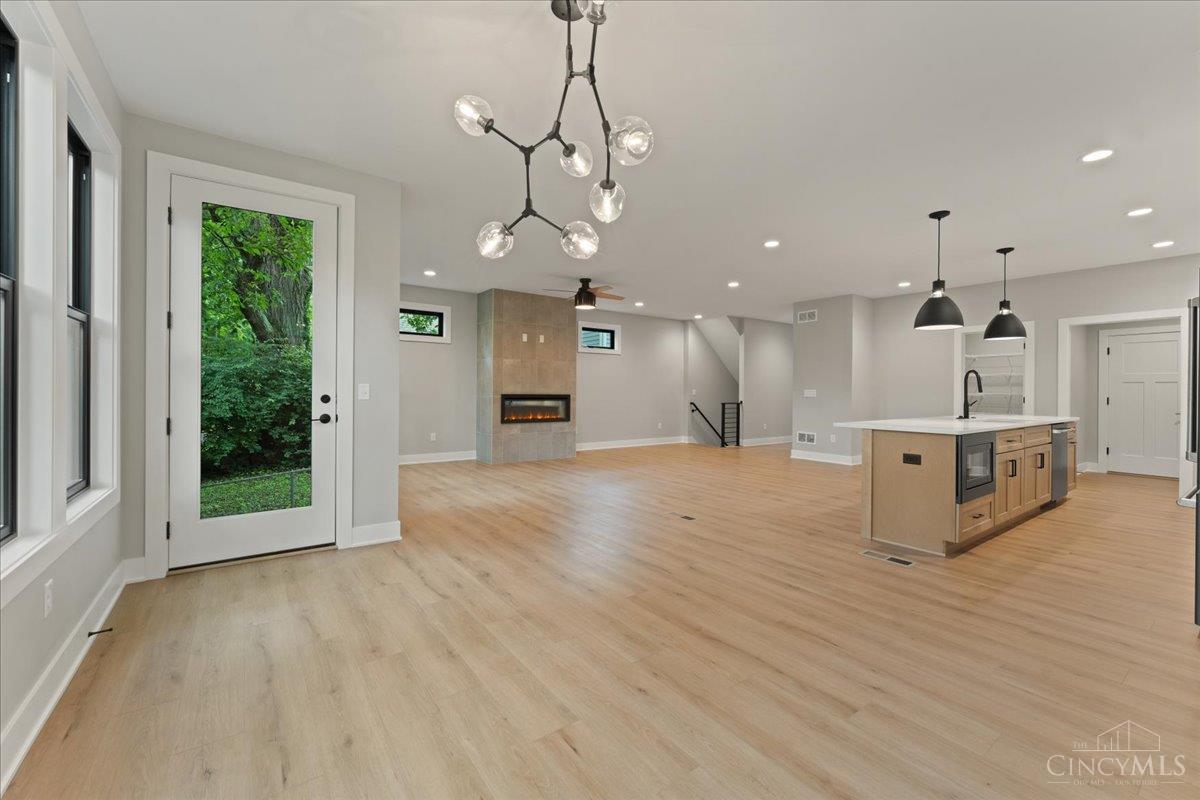 15 yr LEED Gold tax abatement eligible! Brand new home just seconds from everything in Oakley! You can have it all: 2,590 finished sqft (w/ option to finish LL), hardwood flrs, great rm w/ fireplace, gourmet kitchen, formal dining rm, primary suite w/ oversized walk-in clst, high end finishes, 2 car garage, rear patio & wooded valley view! By Five Daughters Construction. Immediate Occupancy!