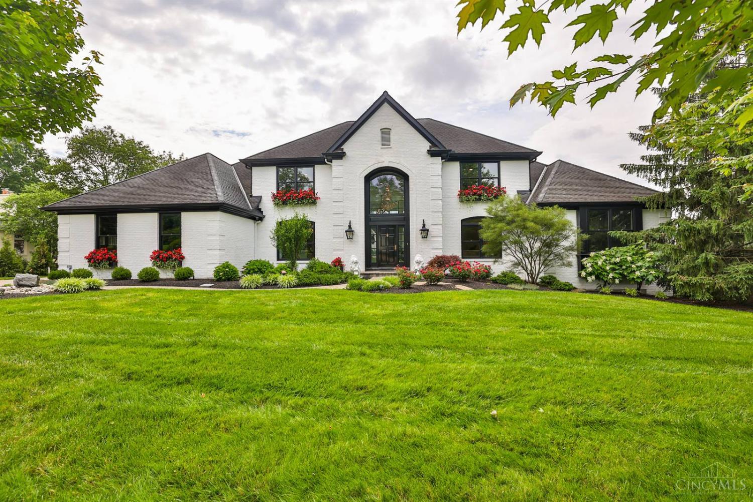 Magnificent River View! Experience the pinnacle of comfort and luxury in this extraordinary 5 BR, 4 Bath home with over 8,000 total sq ft of beautifully designed living space. Home is an entertainer's dream, boasting an ultra high-end kitchen with Viking appliances and designer finishes. Features expansive entertainment areas and 1st floor primary with a custom walk-in closet with custom lighting. Step outside to a multi-tiered deck overlooking the Ohio River, complete with a spa and fountain - a serene backdrop for relaxing or entertaining. Walkout lower level with home gym and sauna. This is a beautiful upscale living home!