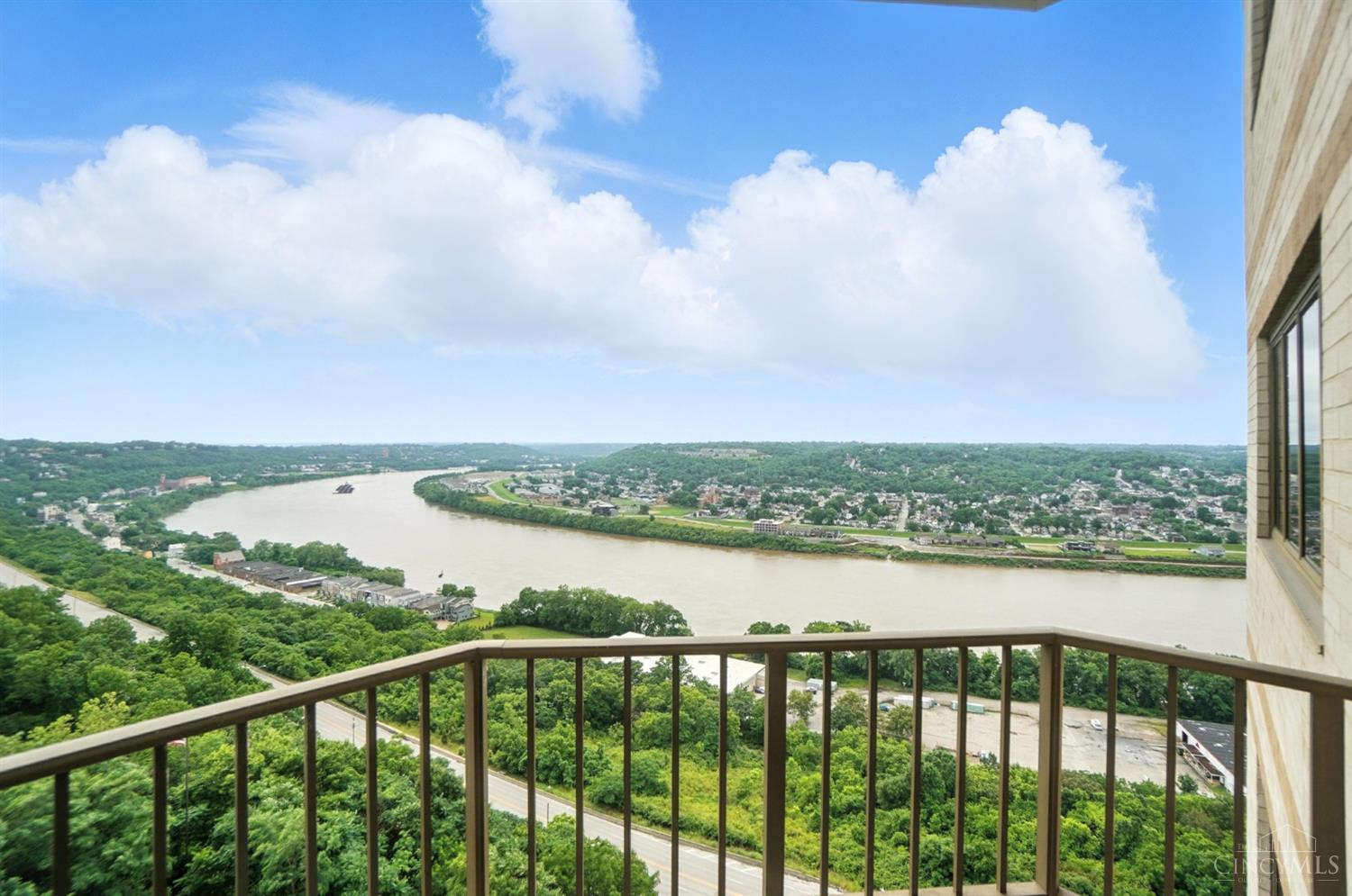 Phenomenal river, city & Kentucky hillside views from every window & door in this sensational 2,888 square foot Edgecliff Point condo! 3 balconies, 2 car garage, subzero & granite kitchen w/ breakfast room- bookcases- jacuzzi- fantastic closets - hardwood floors - guest suites & party facilities - pool - fitness center - 24 hour doorman - this has it all! Leave offers open for 48 hours - seller reserves the right to accept an offer prior, no escalation clauses.