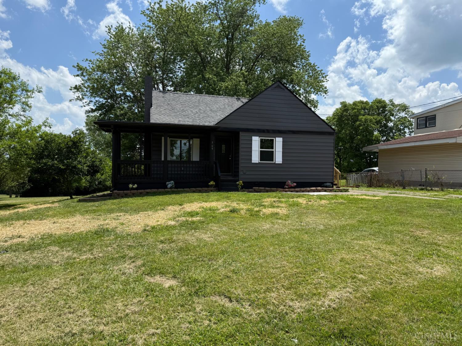 Don't miss out on this completely renovated 3 bedroom cape cod. This home is conveniently located just outside of Hamilton's West Side. Country living close to town that offers new roof, windows, doors, flooring, kitchen and bath, updated electric, glass block windows, HV/AC, and water heater. Brand new asphalt driveway for plenty of parking and new deck with entry to kitchen. Seller had full septic inspection perfomed 7/1/25.