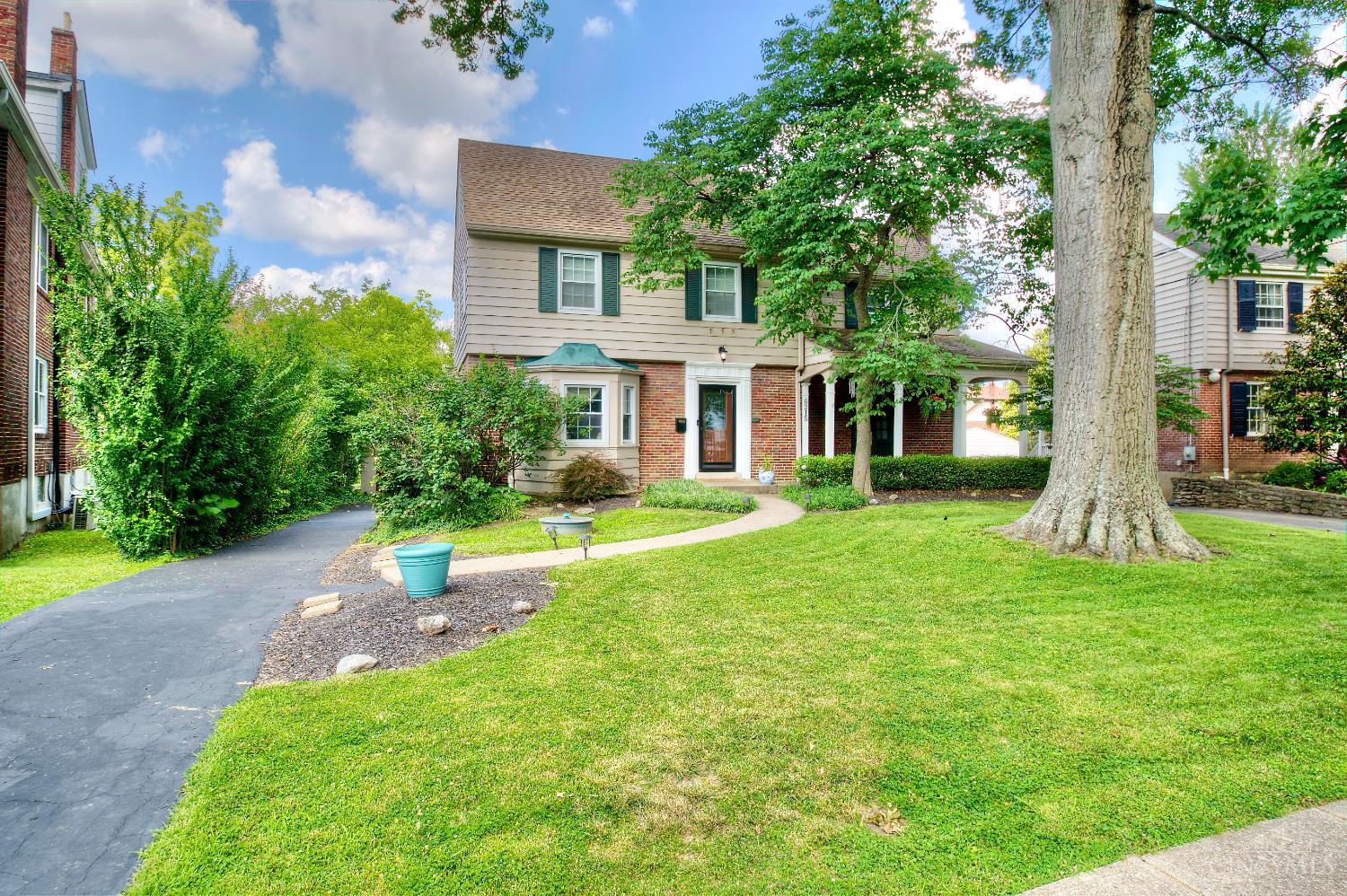 Colonial-style home in Pleasant Ridge! Charming covered front porch with ceiling fan. Updated kitchen and bathrooms. with one on each floor. Beautiful random peg hardwood floors throughout. Spacious family room in the basement with great natural light. True three-story home blending classic Colonial character with modern updates. Whole house generator for peace of mind. Roof replaced in 2018. Deep backyard perfect for outdoor living. Walkable location near restaurants, shops, and French park.  Don't miss this fantastic opportunity to live on Grand Vista in the heart of Pleasant Ridge.