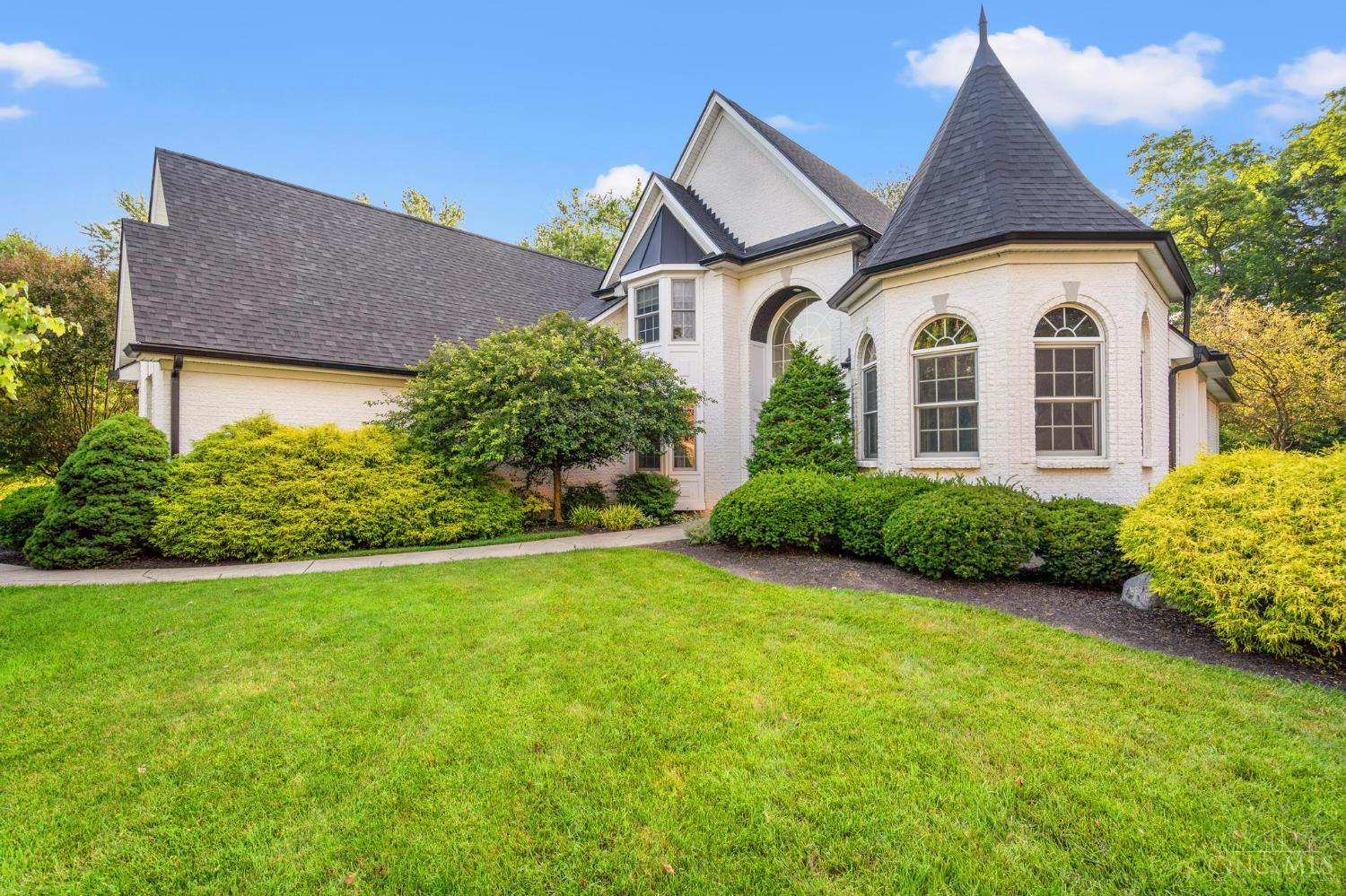 Experience refined living in this stunning 4-bedroom, 4.5-bathroom luxury masterpiece nestled off of Cooper Road next to Swaim Park. Situated blocks from downtown Montgomery and downtown Blue Ash in one of Cincinnati's most desirable neighborhoods. Thoughtfully designed with high-end finishes throughout, this home features an open-concept floor plan, soaring ceilings, and expansive windows that flood the space with natural light.   Enjoy the convenience of the first-level primary suite over looking the beautifully landscaped grounds, a private patio with a seamless indoor/outdoor transition. Located minutes from top-rated schools, upscale shopping, and fine dining. Live elevated.