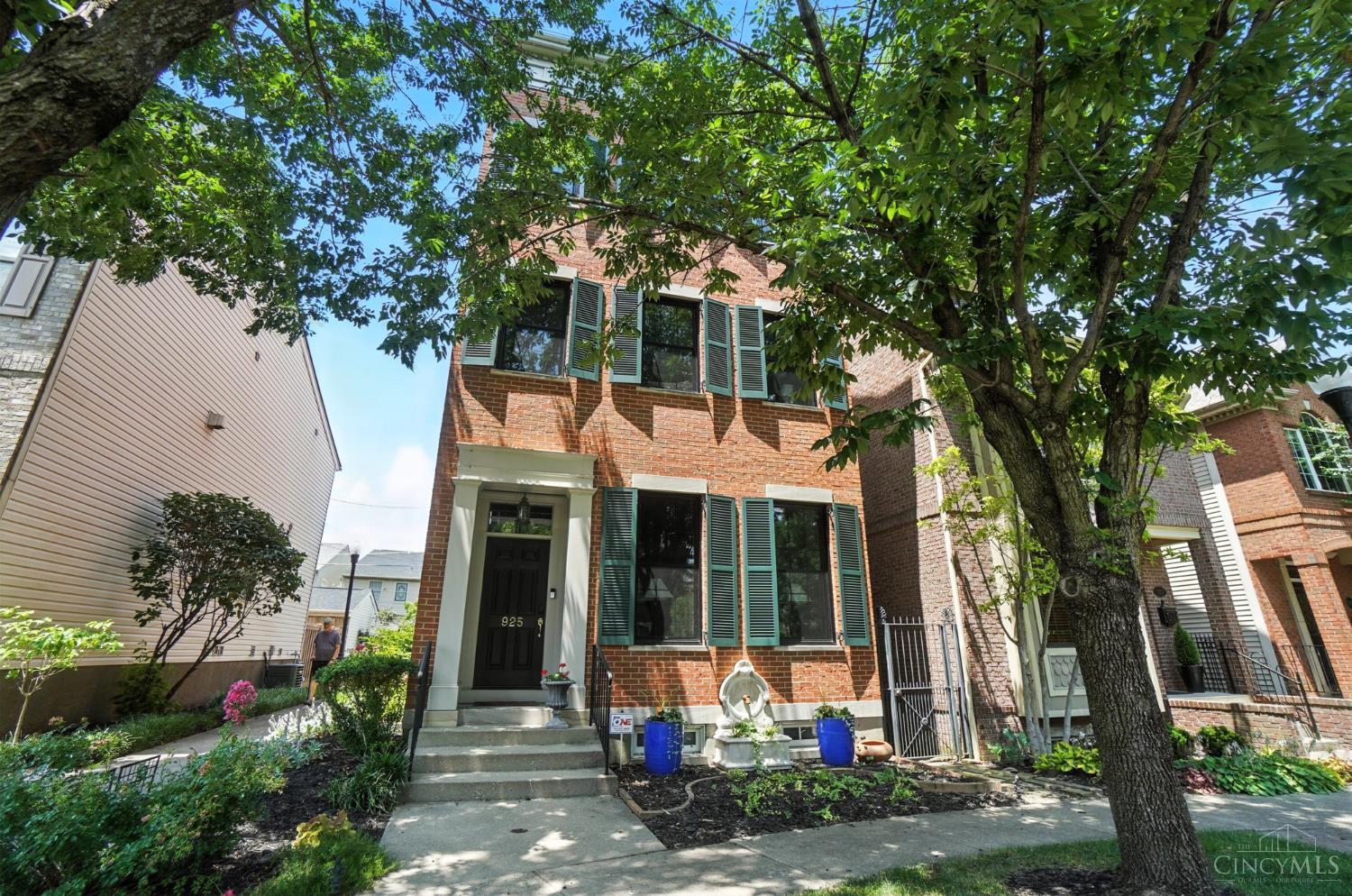 Experience urban city living at 925 Weninger Circle.This stunning 3 story custom built home features 2 Bed (possible 3rd on top floor)/2 full 2 half baths and sits on a quiet tree-lined cul-de-sac.  Inside discover high ceilings,large windows,cozy gas fireplace,hardwood flrs and crown molding througout. Enjoy cooking in the modern fully equipped kitchen with shaker cab, granite counters, stainless appliances and a breakfast nook with lighted display cabinets. Rare 2 car garage enters into screened porch for covered access to kitchen! A full unfinished basement offers endless potential. Unbeatable location close to TQL stadium, Music Hall, and the vibrant shops of OTR and the Business District- enjoy the urban excitement of the city from a peaceful sophisticated neighborhood,  Don't miss this rare opportunity for tranquil and luxurious city living.