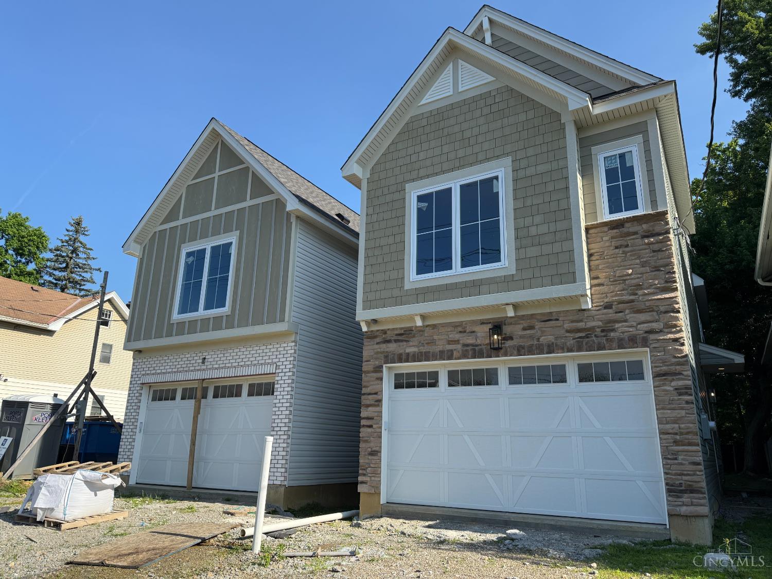 Brand new home just seconds from everything in Oakley! You can have it all: 1,783 finished sqft (w/ option to finish LL), hardwood flrs, great rm w/  fireplace, gourmet kitchen, primary suite w/ walk-in clst, high end finishes, 2 car garage, rear deck & rooftop deck! By Ashford Homes. Mins from Oakley Sq, walkable to MadTree Brewing, dining-shopping, new 3.5M Rec Center, & more!