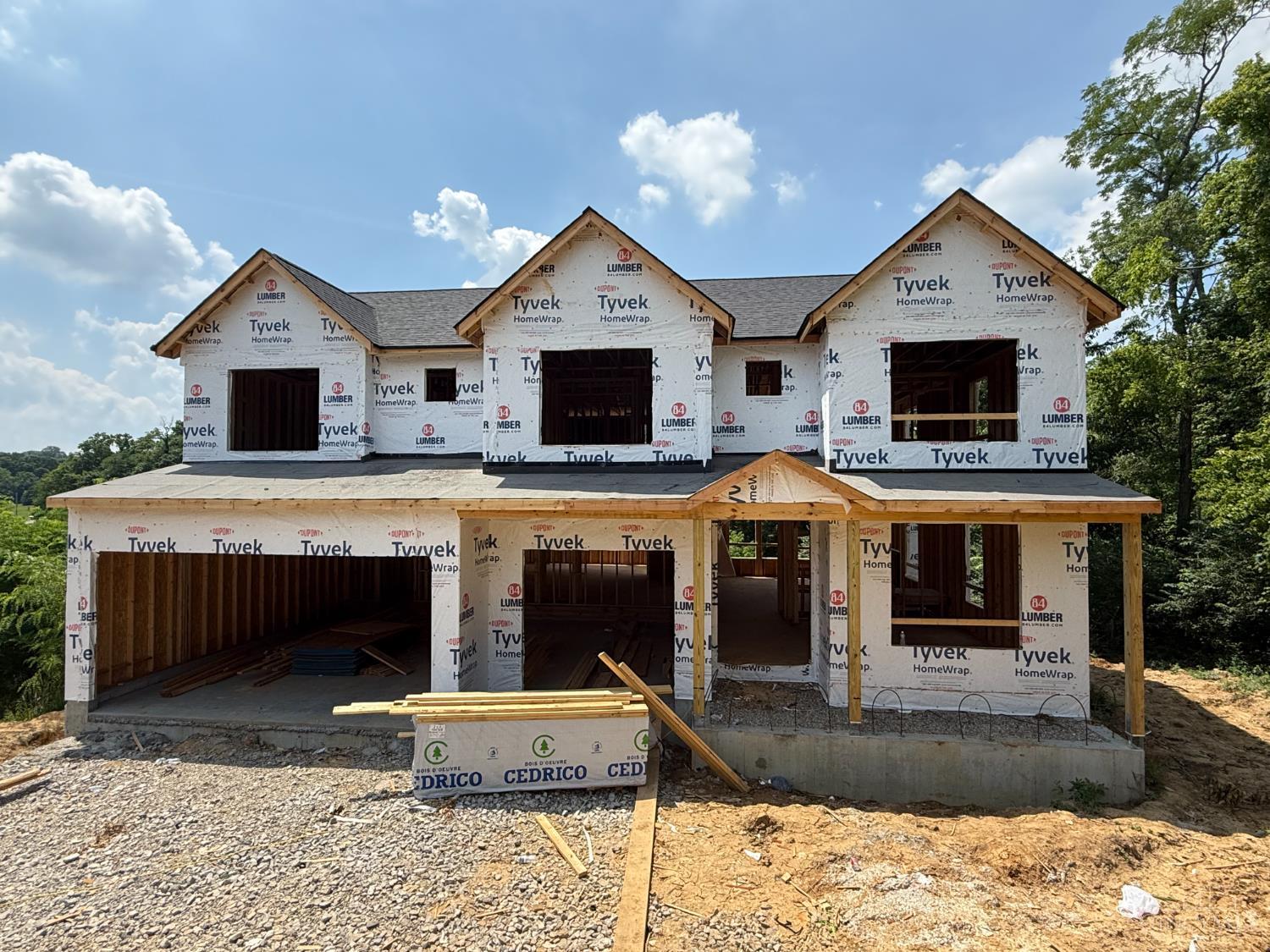 So many features in this beautiful new build from Five Daughters Construction. 4,000 finished sqft of open concept living. Soaring 18' Great Room ceilings & massive windows overlooking private wooded view. 9' ceilings in basement and 1st floor. The walkout finished basement is perfect for entertaining. Spacious composite deck overlooks yard. Late fall completion.