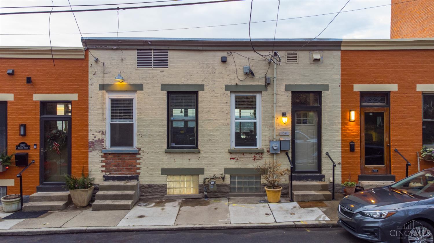 Stunning Mt. Auburn Home with Breathtaking Downtown Views.  Beautifully remodeled in 2022 and located on a no through street, you'll enjoy peace and tranquility while being just steps away from everything downtown has to offer.  Right outside your door is the vibrant Walker Street Conservancy.  This home is not just a place to live - it's a lifestyle.  Full remodel & tax abatement offer peace of mind and significant savings.  Remodel scope included opening two parcels into one creating an open concept kitchen & entertaining space boasting gorgeous hardwoods, a skylight and a new fireplace & chimney.  New mechanicals, windows, electric panel & wiring & whole house plumbing updates throughout. Seller financing available.