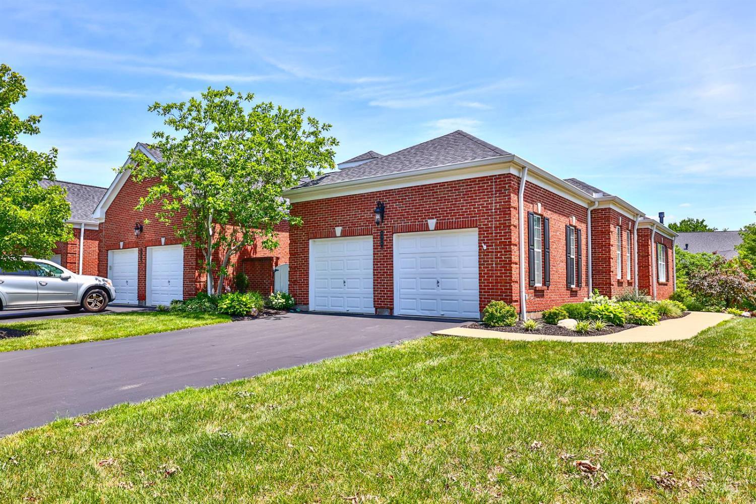 Lovely Spacious 3,000 sq ft Condo in Highly Desirable Somerset Community. First floor en suite primary bedroom w/updated bath features double bowl sinks, Quartzite vanity tops, tiled backsplash, oversized ceramic tile walk-in shower w/seat & ceramic tile floors. Welcoming updated kitchen w/large Quartzite island & counter tops, 42 white cabinets, marble backsplash, Bosch dishwasher, French door refrigerator, Gas range and LVP flooring. The kitchen walks out to a private courtyard w/composite flooring & natural gas outlet for your grill. Living room walks out to screened deck overlooking a serene pond in a private setting. Entry level offers hardwood flooring, gas fp w/marble surround, 10' ceilings, crown molding, plantation blinds, study w/French doors & powder room w/pedestal sink. Lower level features walkout, spacious rec room, wet bar, en suite bedroom & ample storage areas. New landscaping. Community amenities include pool, clubhouse, fitness, tanning, courts and more!