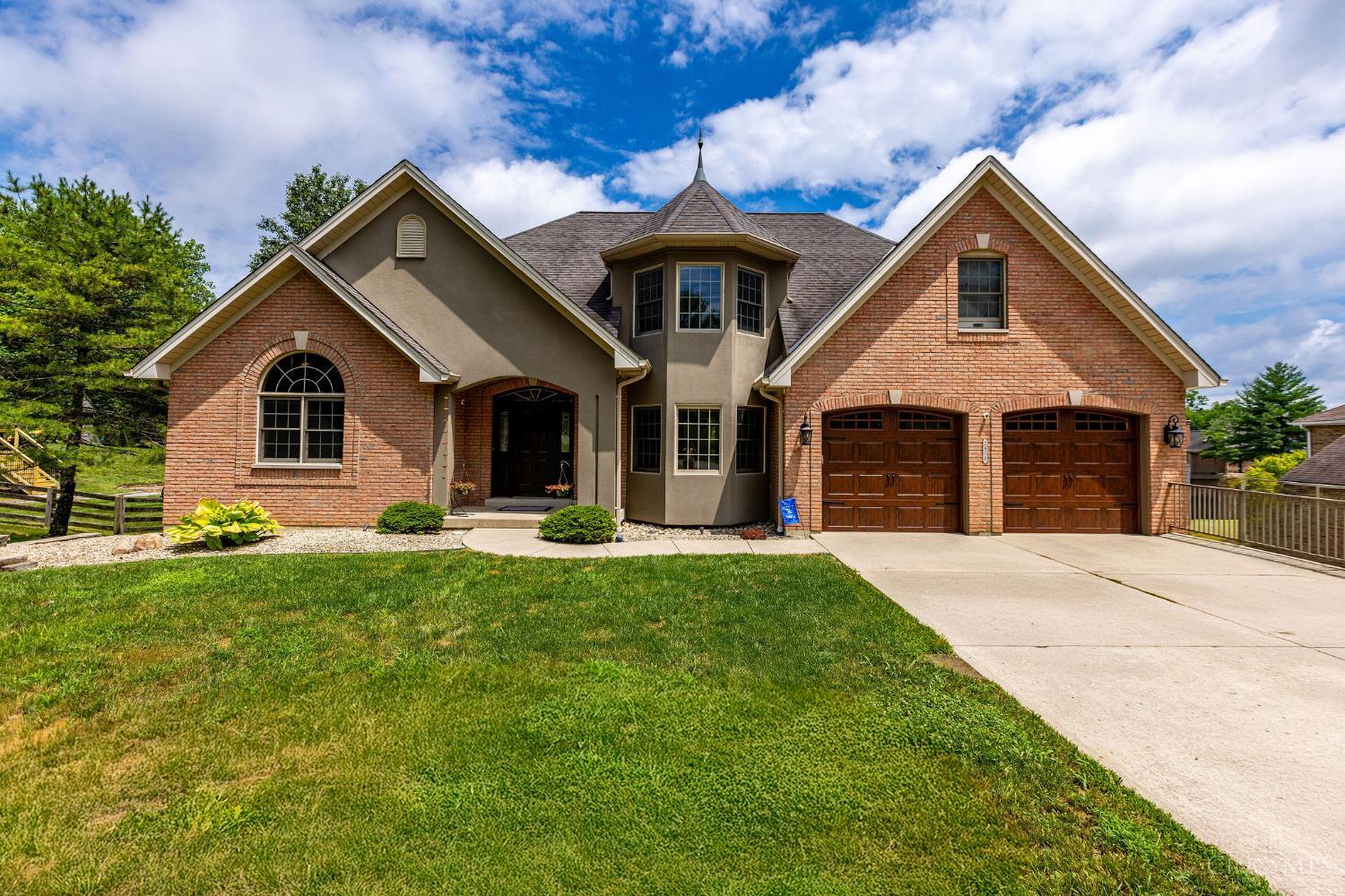 This 4 bd custom built home has all the bells & whistles and is the perfect home for entertaining year-round! The moment you step inside you will appreciate the soaring cathedral ceilings in the 1st  flr study, great rm & primary suite!  The chef's delight kit boasts an abundance of cabinets & granite countertops! The upstairs offers 3 additional bdrms. The lower level has it all featuring a full gourmet kit, media rm complete w/all equipment, rec rm complete w/pool table & a rm specially designed for the fur babies!  Step outside to enjoy a summer oasis including a covered deck, patio, hot tub and pool! 4 car garage & extra drive are perfect for storing the boat or RV.