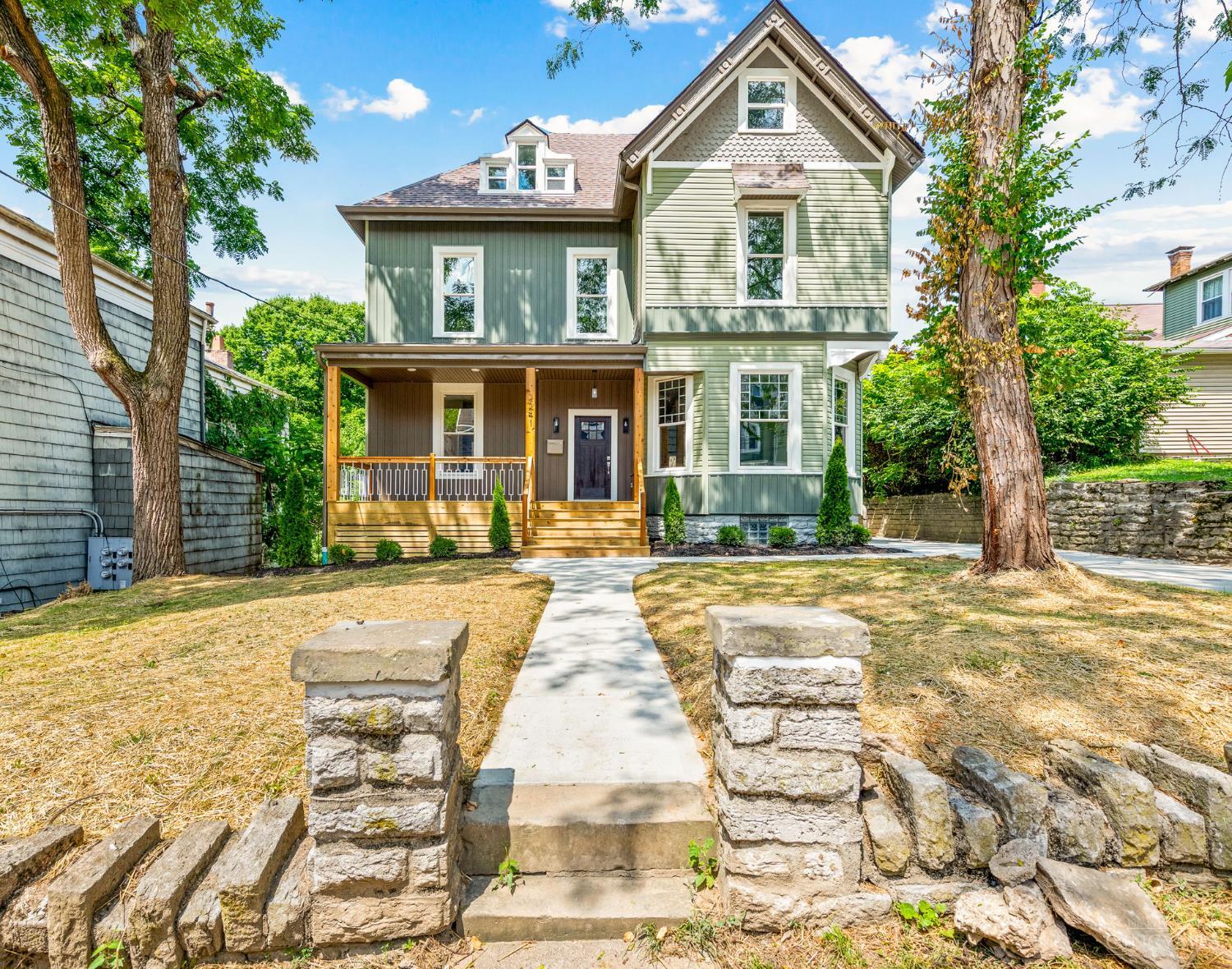 Completely rebuilt and tax-abated, this stunning East Walnut Hills home by Urban Modern offers nearly 3,500 sq ft of finished space just a short walk from Eden Park. With 5 bedrooms, 4 full baths & 2nd floor laundry, the layout is functional and spacious. The open floorplan features 12-foot ceilings, new hardwood floors, custom cabinetry & detailed woodwork that blends modern style with historic charm. Major systems are all new, including electrical, plumbing, HVAC, insulation, & finishes. You'll also find quartz countertops, tiled baths and laundry, and high-end fixtures throughout. Outside features include a new driveway, sidewalks, front porch, rear deck, and fenced backyard. Located minutes from downtown and steps to Krohn Conservatory, the Art Museum, and Playhouse in the Park. If it's dining & drinks you're after, nearby favorites include Cafe Mochiko, The Fix, and Alcove by Madtree. Upgrade your lifestyle with this maintenance free, 12-year tax abated home!