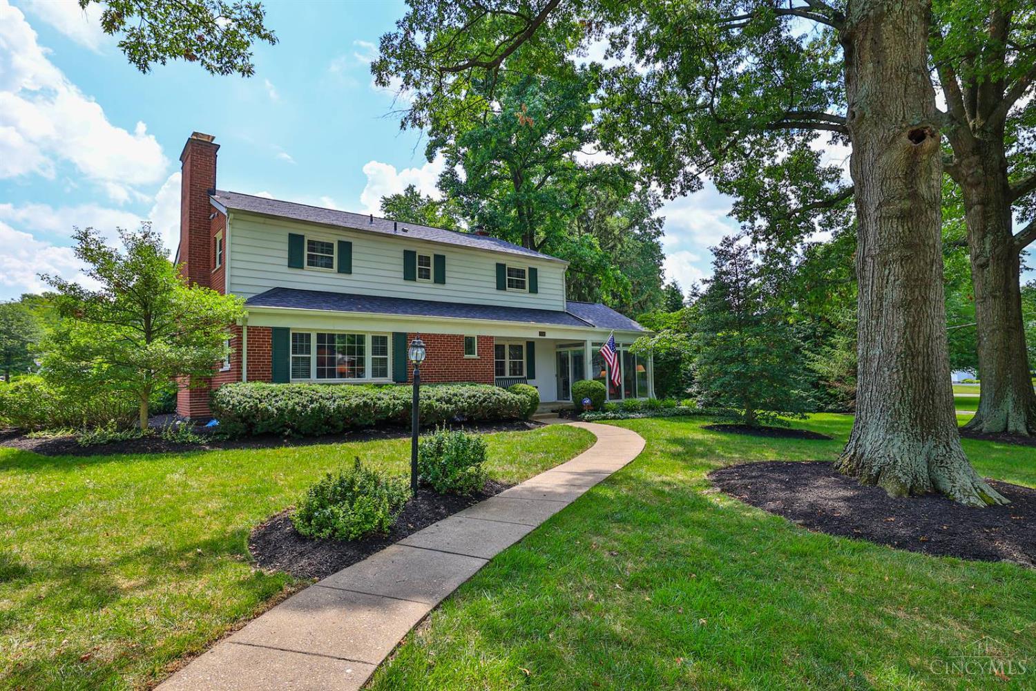 7232 Quailhollow Drive Sycamore Twp, Ohio Charming Home in Coveted Kenwood Meadows.Sit back and relax on the front porch of this delightful home, nestled on a quiet cul-de-sac in sought-after Kenwood Meadows. Shaded by a stately oak and surrounded by a beautifully manicured yard, this home offers warmth and character throughout.Inside, you'll find hardwood floors, coved ceilings with classic moldings, and two wood-burning fireplaces that add timeless charm. A cheery 11 x 17 3-season sunroom extends your living space, while tasteful decor and thoughtful updates make this home move-in ready. Rec room has a wet bar, and wood-burning fireplace. Recent Improvements Include: 2025: Fresh driveway coating, replaced basketball lights, serviced sump pump 2024: New roof, AC unit, and rear exterior doors 2021: New rear concrete sidewalks and gas hot water heater Conveniently located near shopping, dining, and expressways, this lovingly maintained home is a rare find in an ideal location.
