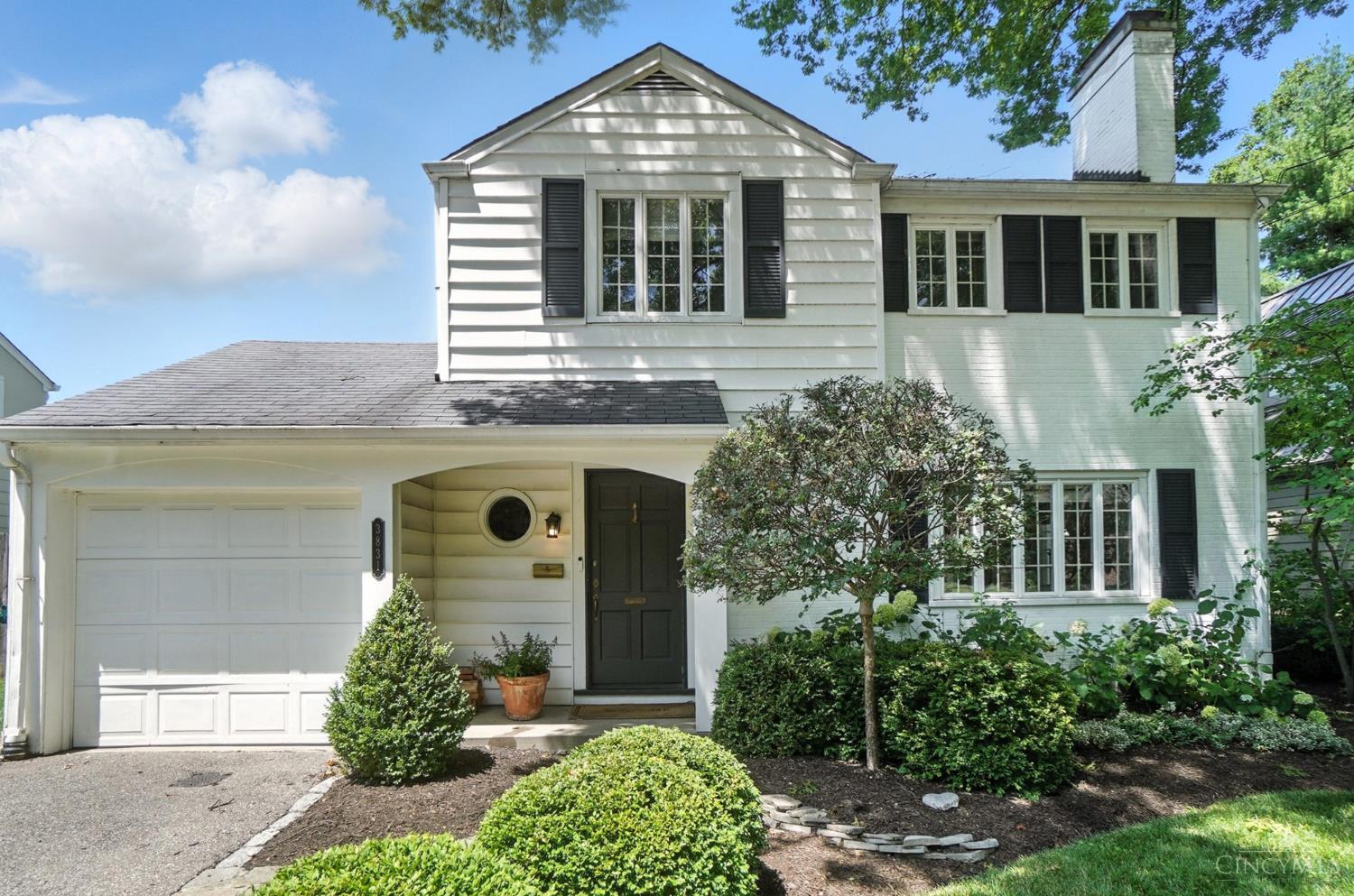 Charming home in picturesque Hyde Park neighborhood! Classic, high-end finishes throughout. Beautifully renovated kitchen with wood cabinets, marble countertops/backsplash, updated fixtures & appliances opens to dining room and living room. Family room with built-ins and fireplace overlooks flat backyard and walks out to European patio. Partially finished LL with full bathroom. Beautifully updated full bathroom on second floor and half bathroom on first floor. Fully fenced in lot with mature landscaping. Experience the quintessential neighborhood!