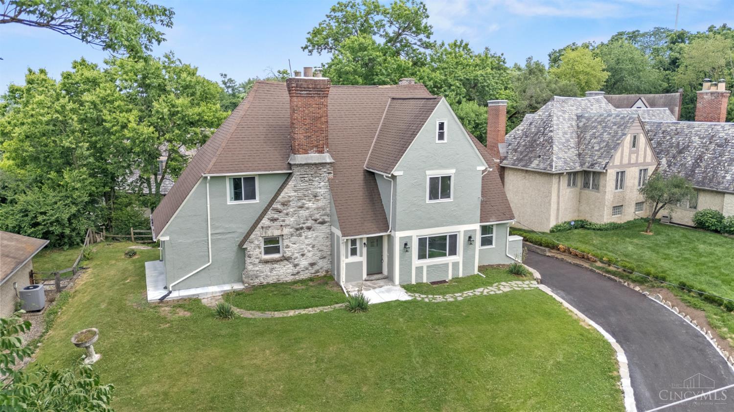 Step into timeless elegance at 4150 Paddock Road! A fully reimagined 1926 transitional Tudor with over 3,200 sq ft of meticulously designed living space. This 4-bed, 3.5-bath home blends classic charm with contemporary finishes. The open layout connects a kitchen with custom cabinetry, quartz countertops and high-end appliances - to a bright dining area and inviting living room. Upstairs, the expansive primary suite features a spa-inspired bath and three closets. Two bedrooms share a Jack-and-Jill bath, while the third floor includes a private bedroom, full bath, and flex space perfect for an office or guest suite. Located across from Avon Fields Golf Course and minutes from major highways, this is a rare opportunity to own a stunning, restored classic. Video Tour Attached!